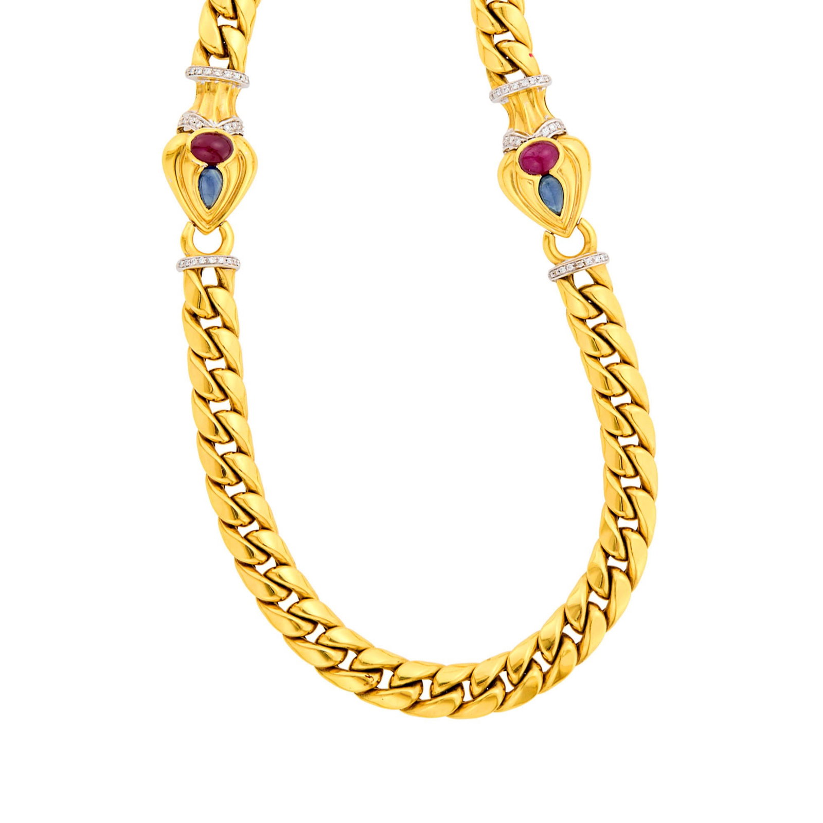Long Two-Color Gold, Cabochon Ruby, Sapphire and Diamond Curb Link Necklace/Bracelet Combination: 18 kt. yellow and white gold, 3 pear-shaped cabochon sapphires, 3 oval cabochon rubies, 72 round diamonds ap. 1.40 cts., with Italian marks, detachable into necklace and bracelet, ap. 129.6 dwts. Leng