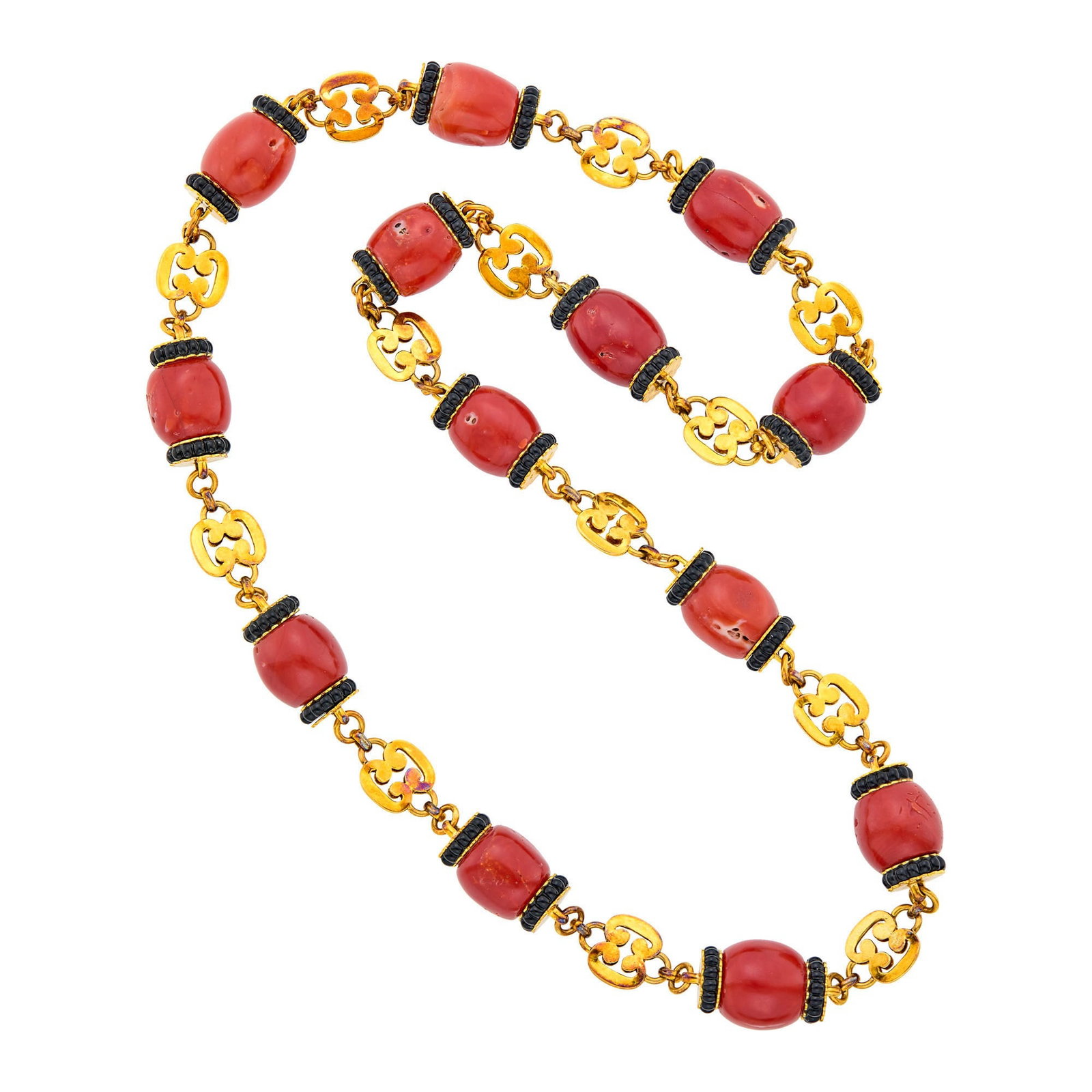 Trio Long Gold, Coral and Black Onyx Bead Chain Necklace: 14 kt., 13 barrel-shaped coral beads ap. 20.0 x 18.0 to 18.5 x 18.4 mm., carved black onyx rings, signed Trio, ap. 198.5 dwts. gross. Length 30 inches, no clasp. Coral: medium-deep reddish orange to o