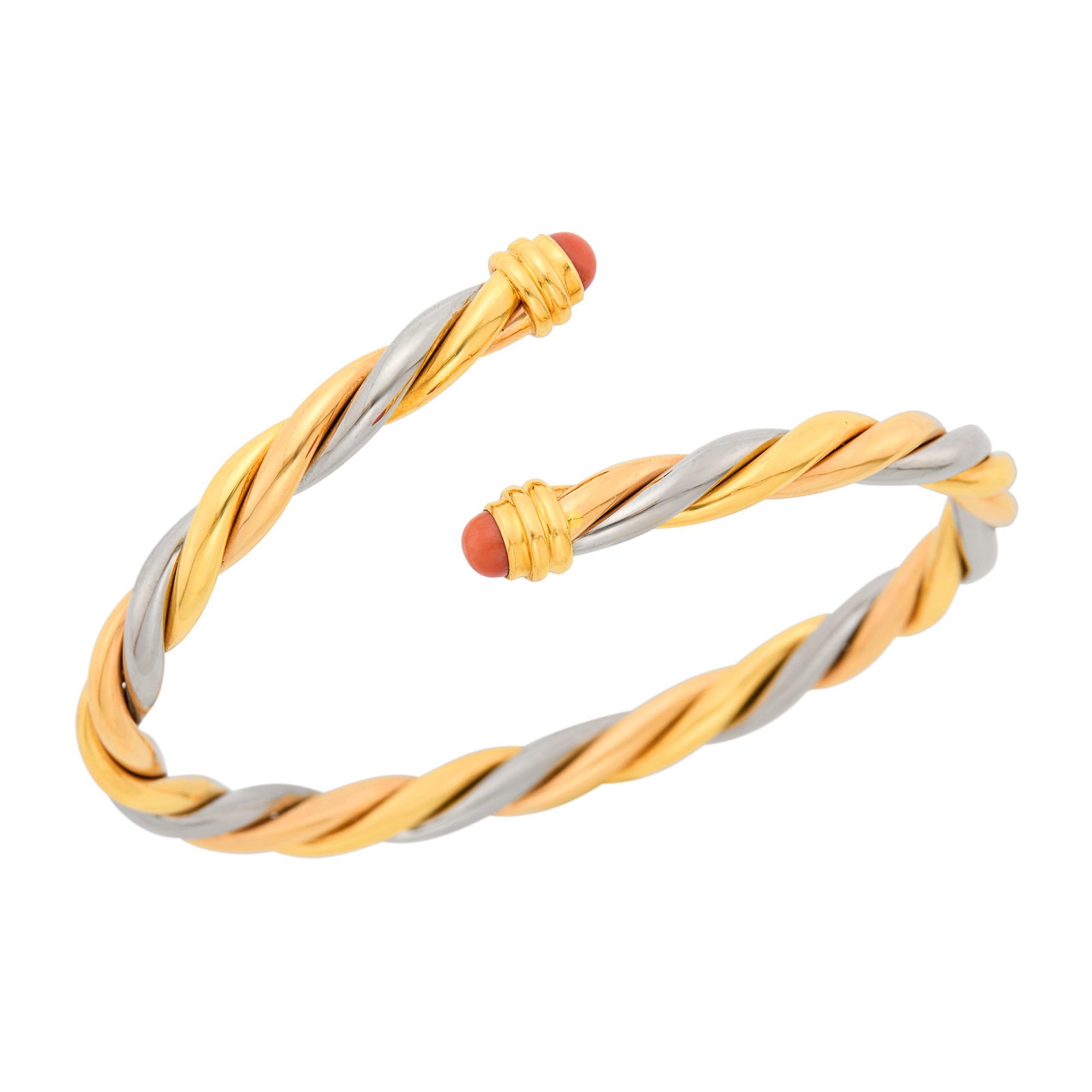 Cartier Tricolor Gold and Coral Crossover Twisted Bangle Bracelet, France: 18 kt. yellow, white and rose gold, 2 round cabochon coral ap. 4.7 mm., signed Cartier, 1990, no. R05326, with maker's mark and French assay mark, ap. 16.8 dwts. Inner cir. 6 3/4 inches, with open cen