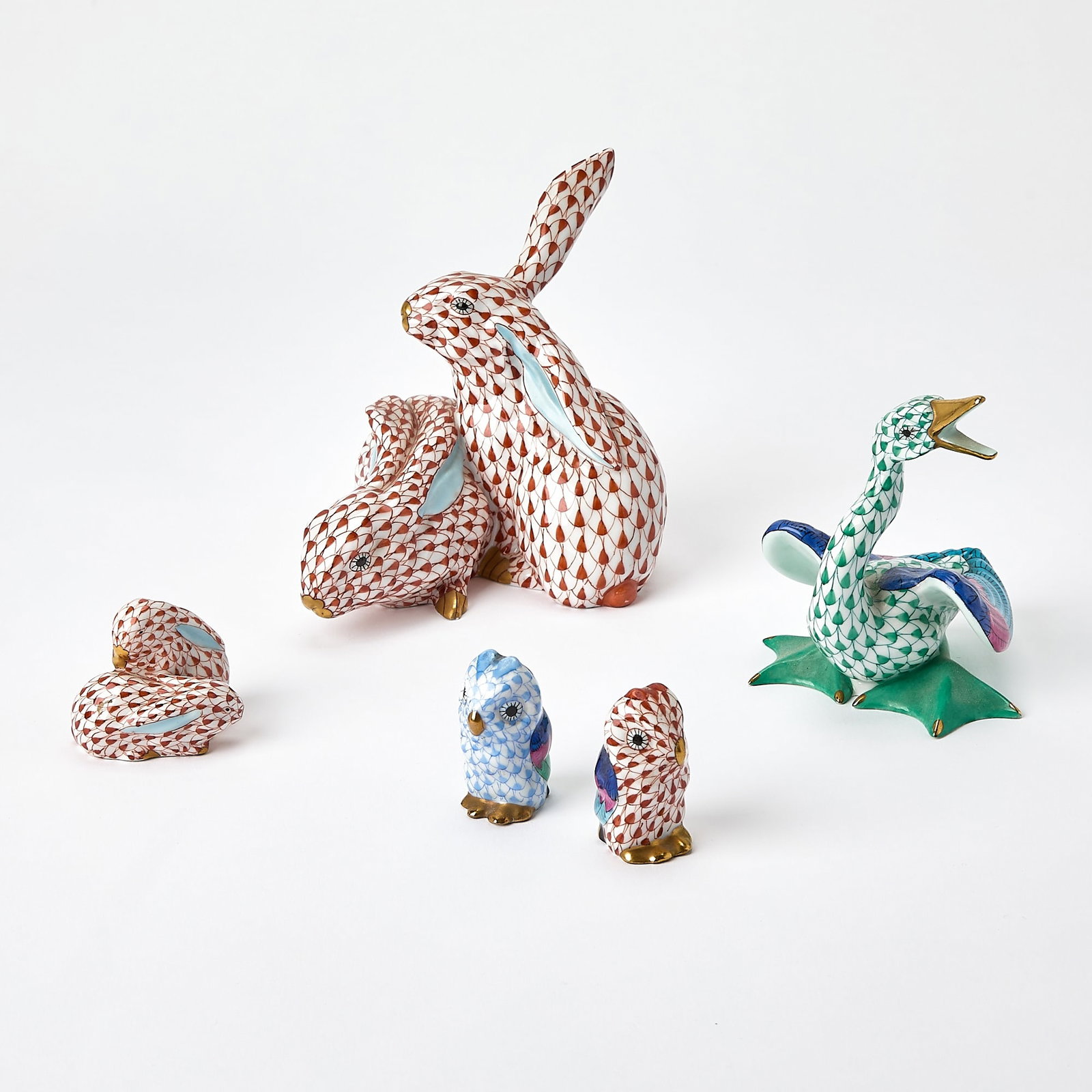 Group of Five Herend Porcelain Figures: 20th century Height of largest 5 inches Rabbit group with chip to underside of foot resulting in losses.