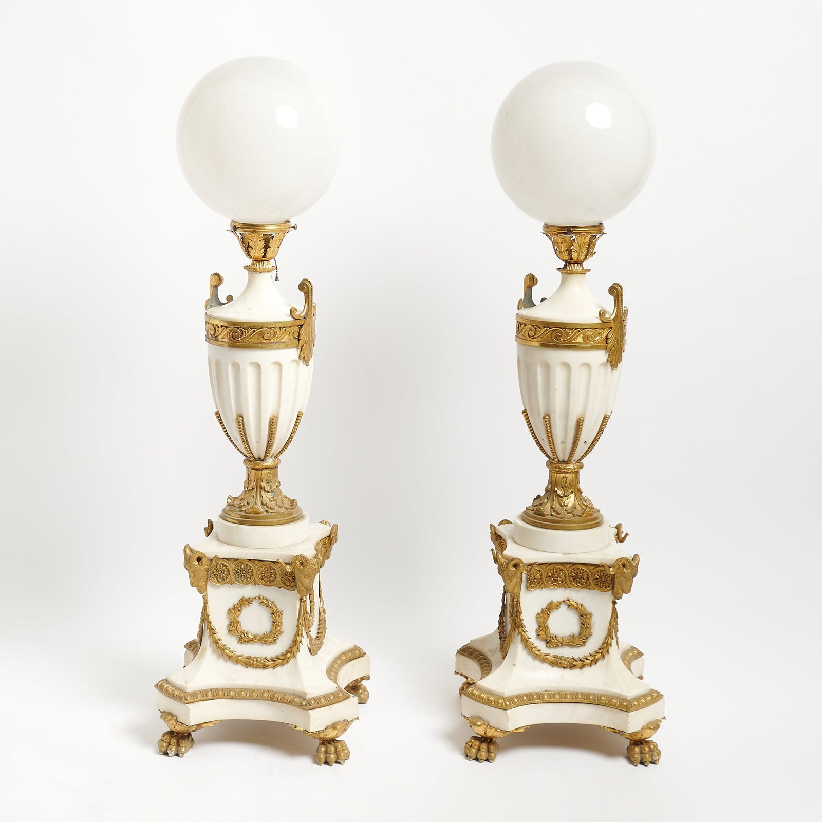 Pair Empire Style Gilt-Metal Mounted Marble Composition Floor Lamps: With white glass shades Height 39 inches, width 15 1/2 inches square