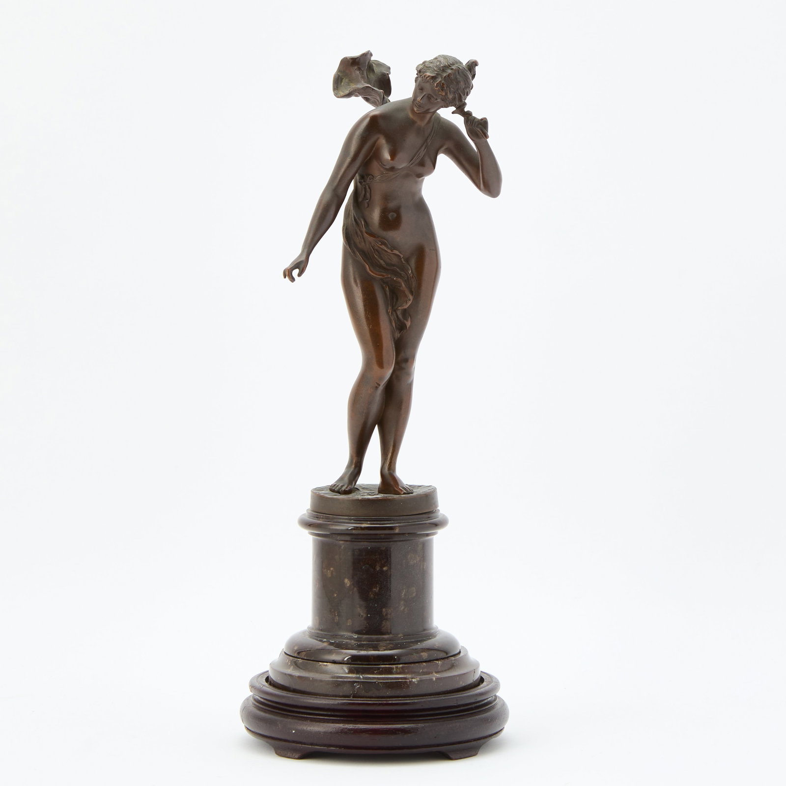Max Lindenberg (1873-1910) Nymph: Late 19th century Bronze on circular marble and wood foot, signed and dated '98. Height 10 inches, overall 14 1/4 inches. (14 inches high) Marble broken, bronze detached from bases.