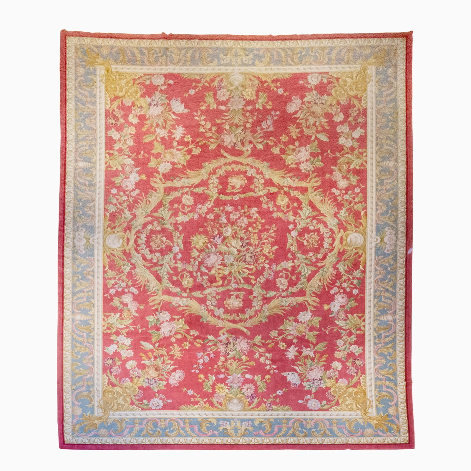 Savonnerie-Style Carpet: China, Contemporary The central floral spray on the rose field is within a slate-blue scrolling acanthus leaf border, monogrammed "RC" for Renaissance Carpets, woven horizontally. (23' 4" x 16' 11")