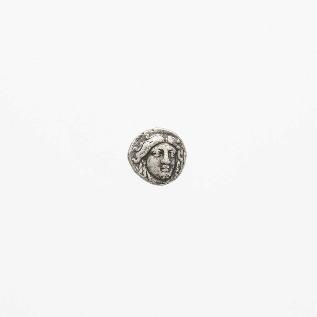 Islands of Caria, Rhodes. c. 333-316 B.C.E. AR Didrachm. 6.61g.: OBV: Head of Helios facing, slightly right. REV: POΔION with rosebud and a grape bunch set within incuse square. SNG Finland 436-440; Ashton, RN (1988). Even dark coloration. Very Good.