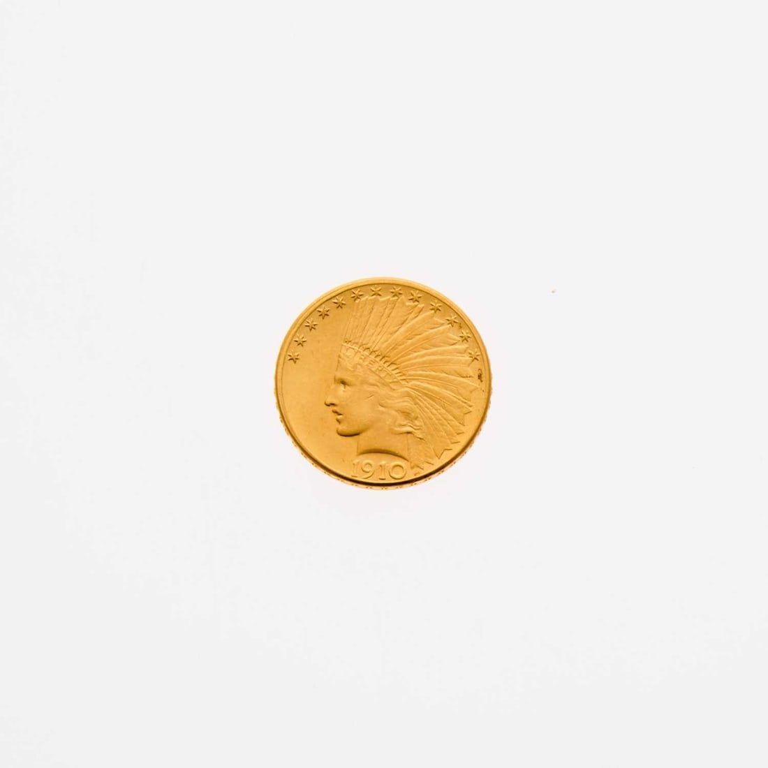 United States. 1910 Indian Head Eagle. Brilliant Uncirculated.: Strong luster. Some minor discoloration around 3 o'clock on obverse and center-left of reverse. Some minor marks. PCGS #:8865 -- NGC ID#: 28GR