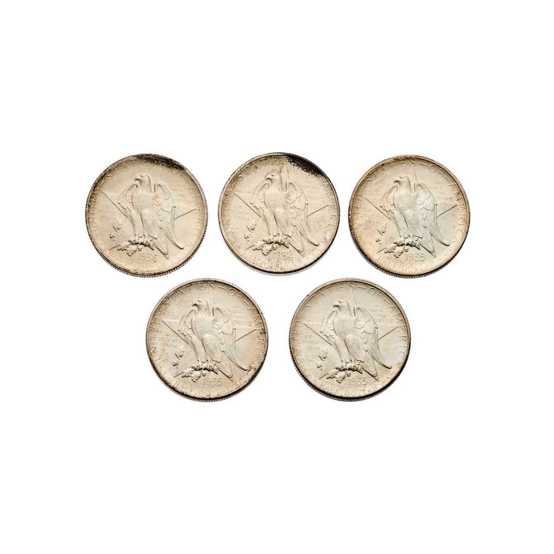 United States. Group of Texas Centennial Commemorative Half Dollars. Mint State.: Five pieces. Dates include: 1934, 1935, 1935-D, 1935-S, 1936. All have detail consistent with Mint State grades, though some of the pieces have minor marks. Light toning on some examples. This is a so