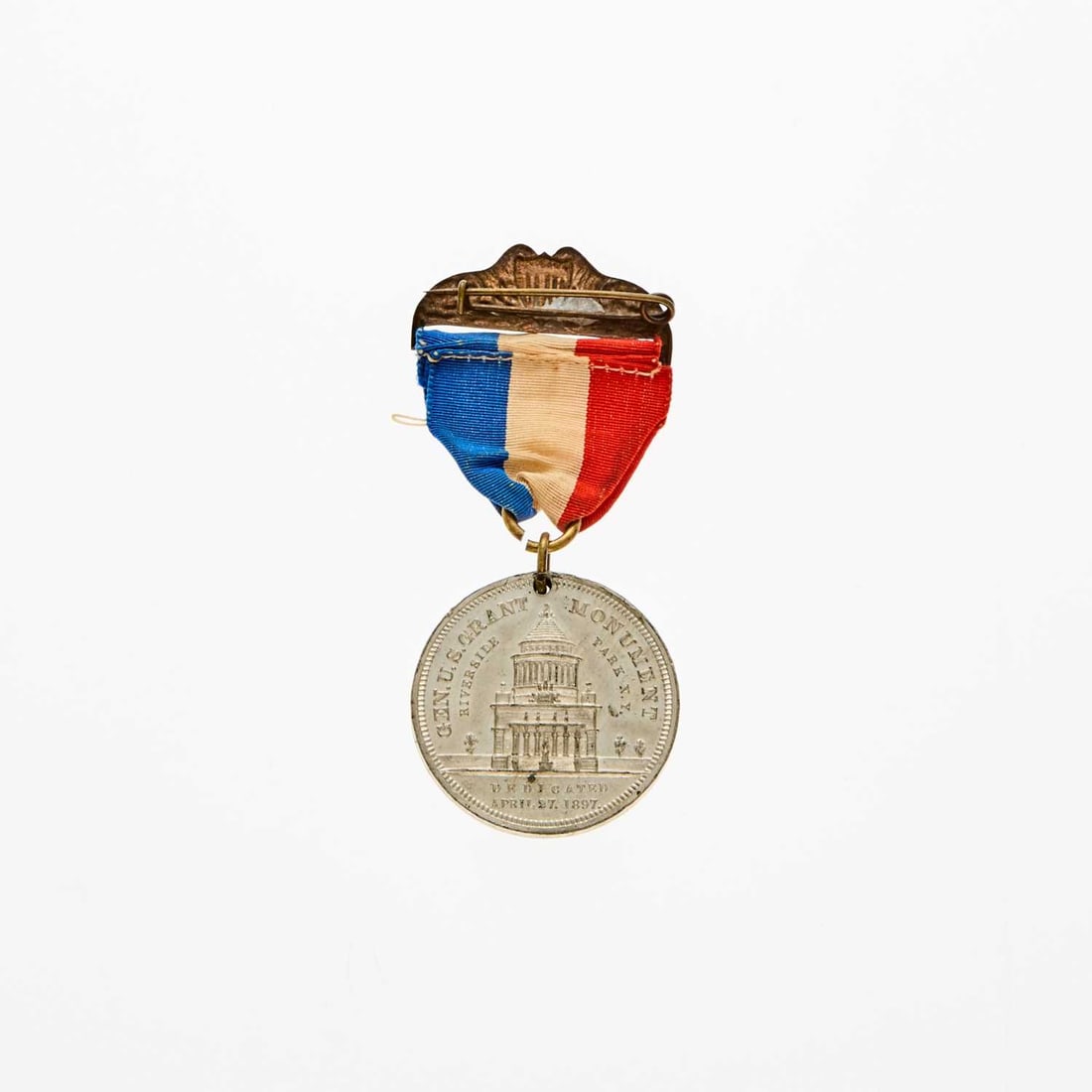 United States. c. 1897 U.S. Grant Memorial Medal. White Metal. 32mm. Mint State.: Holed for suspension as made, with red-white-and-blue ribbon and a Union Shield top bar. Commemorates the opening of Grant's tomb in New York City in 1897. OBV: Raised border with nine stars at top, i