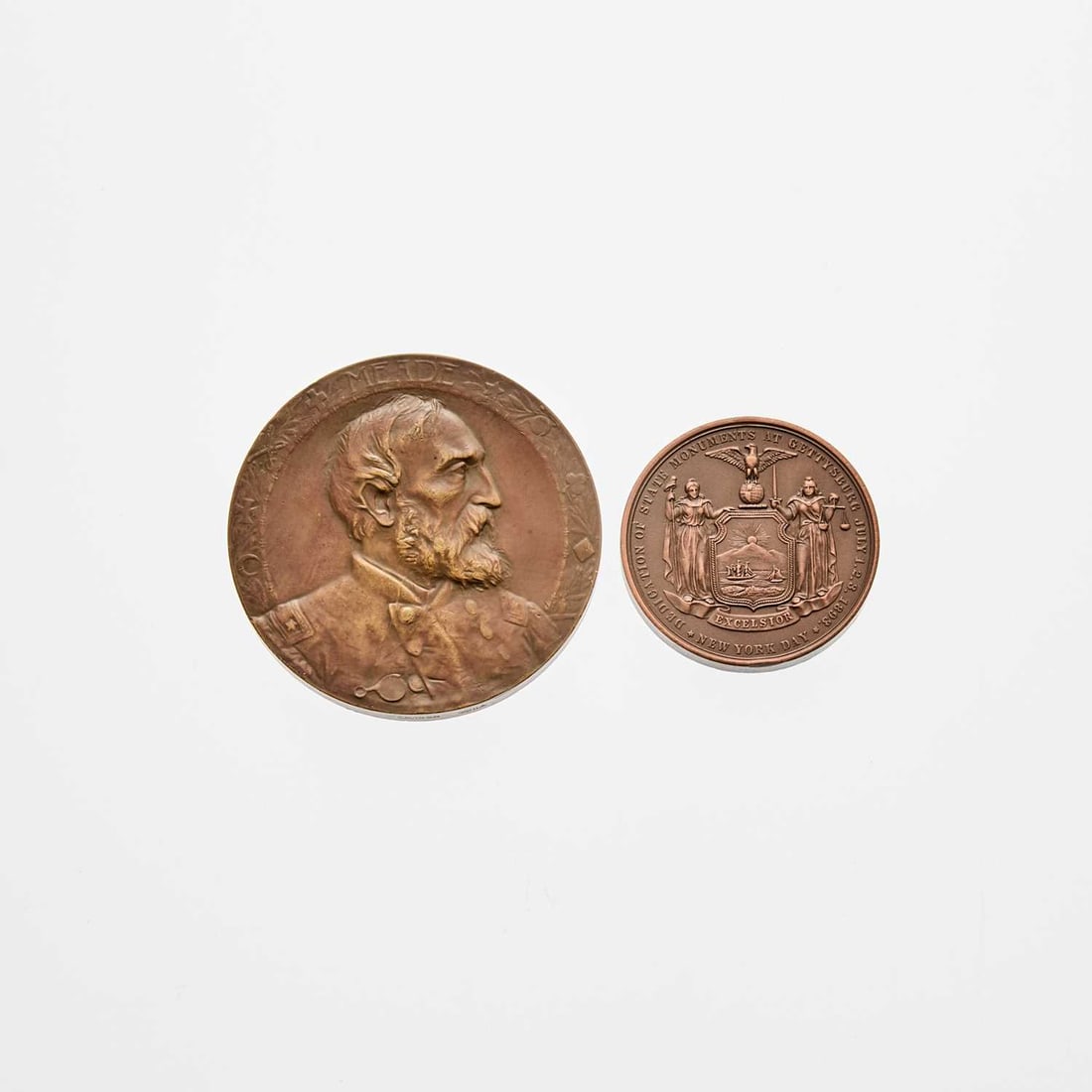 United States. Pair of Gettysburg Monument Medals/ Grades Vary.: Two pieces 1893 Gettysburg Monument New York Day Medal. Bronze. 44.5mm. Extremely Fine Details, rim bumps, some surface environmental damage, formerly mounted for suspension. 1910 Gettysburg Monument 