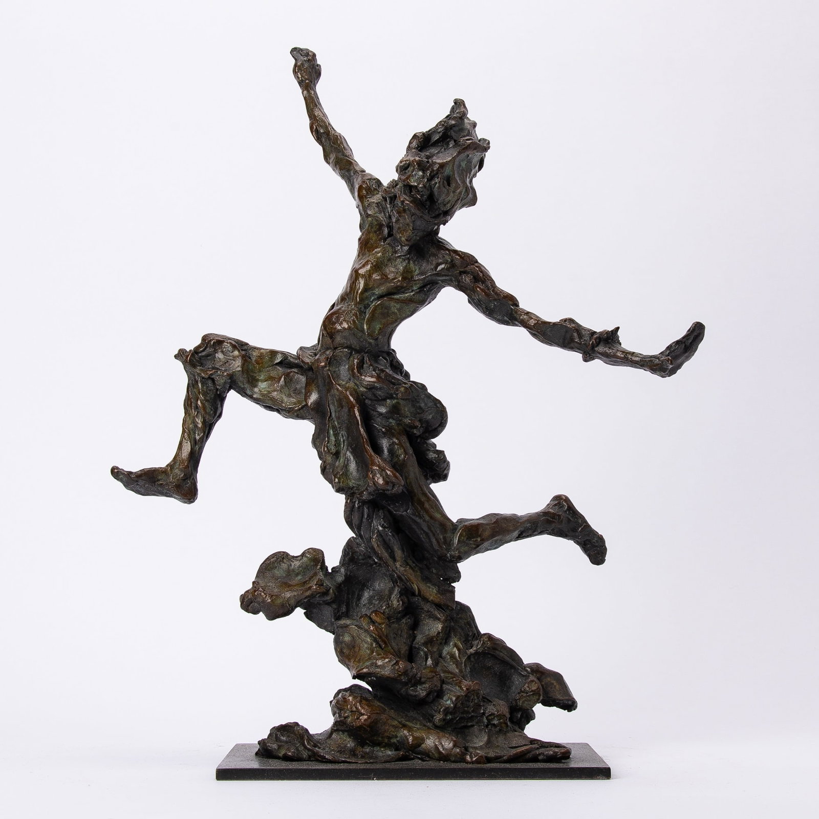 Jonathan Kenworthy: English/American, b. 1943 Kamba Dancer Signed ©Kenworthy, dated 2002 and numbered 3/9 on the base Bronze with green-brown patina Height 17 1/4 inches