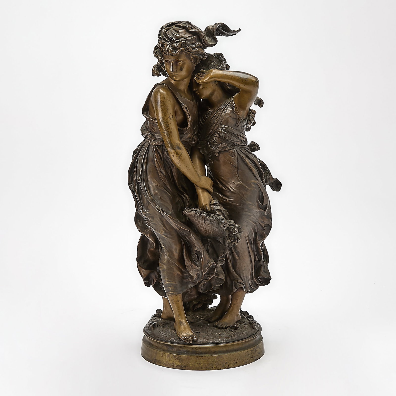 Hippolyte Francois Moreau 'Consolation' Patinated Bronze Sculpture: Late 19th century Depicting a young girl being consoled by her friend, on a circular plinth base, signed to base. Height 23 inches, width 10 inches, depth 8 inches.
