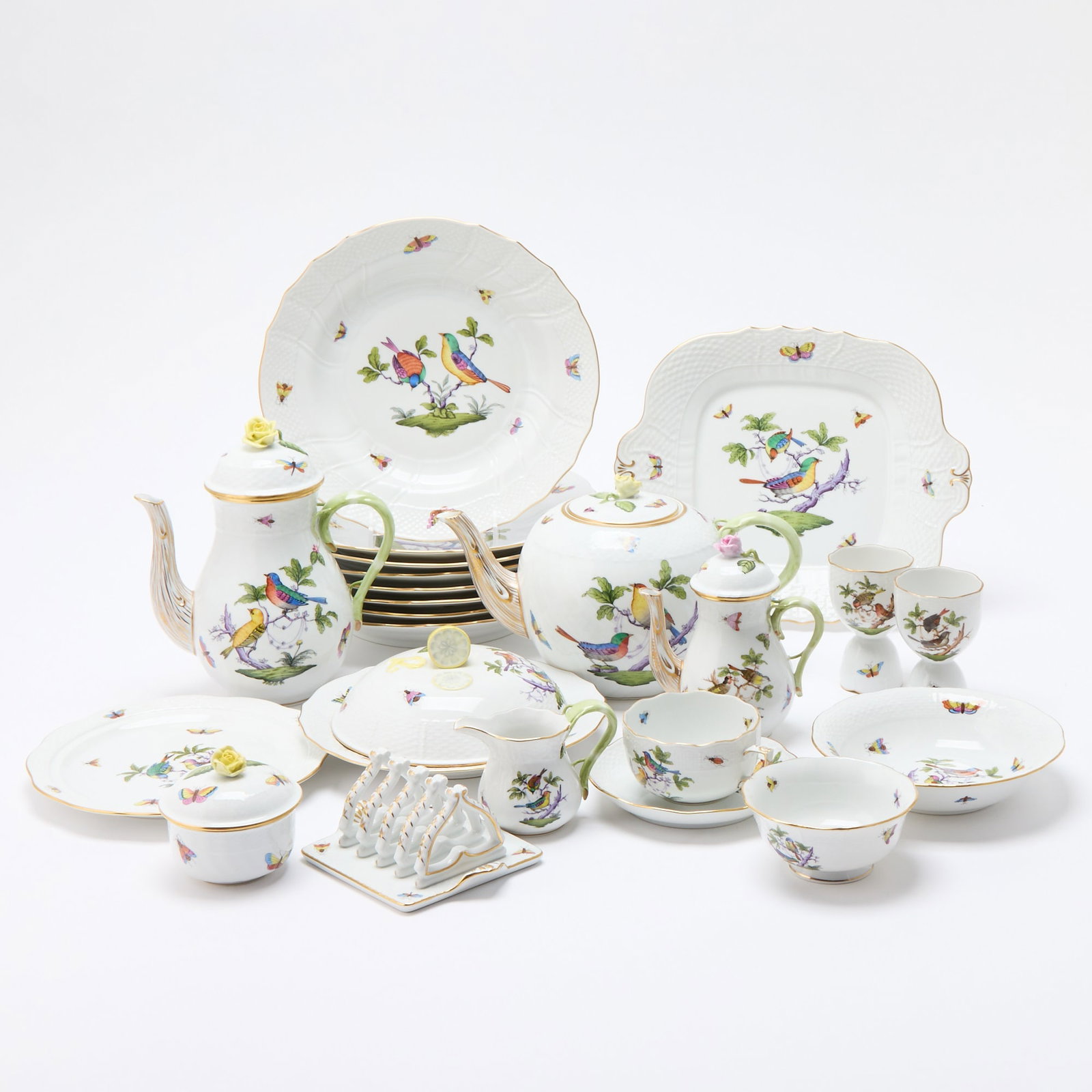 Herend Porcelain "Rothschild Bird" Pattern Partial Dinner Service: Comprising: Twelve dinner plates, diameter 10 3/8 inches Eight rim soup plates, diameter 10 1/8 inches Six dessert plates, diameter 7 3/8 inches Eighteen bread and butter plates Ten coffee