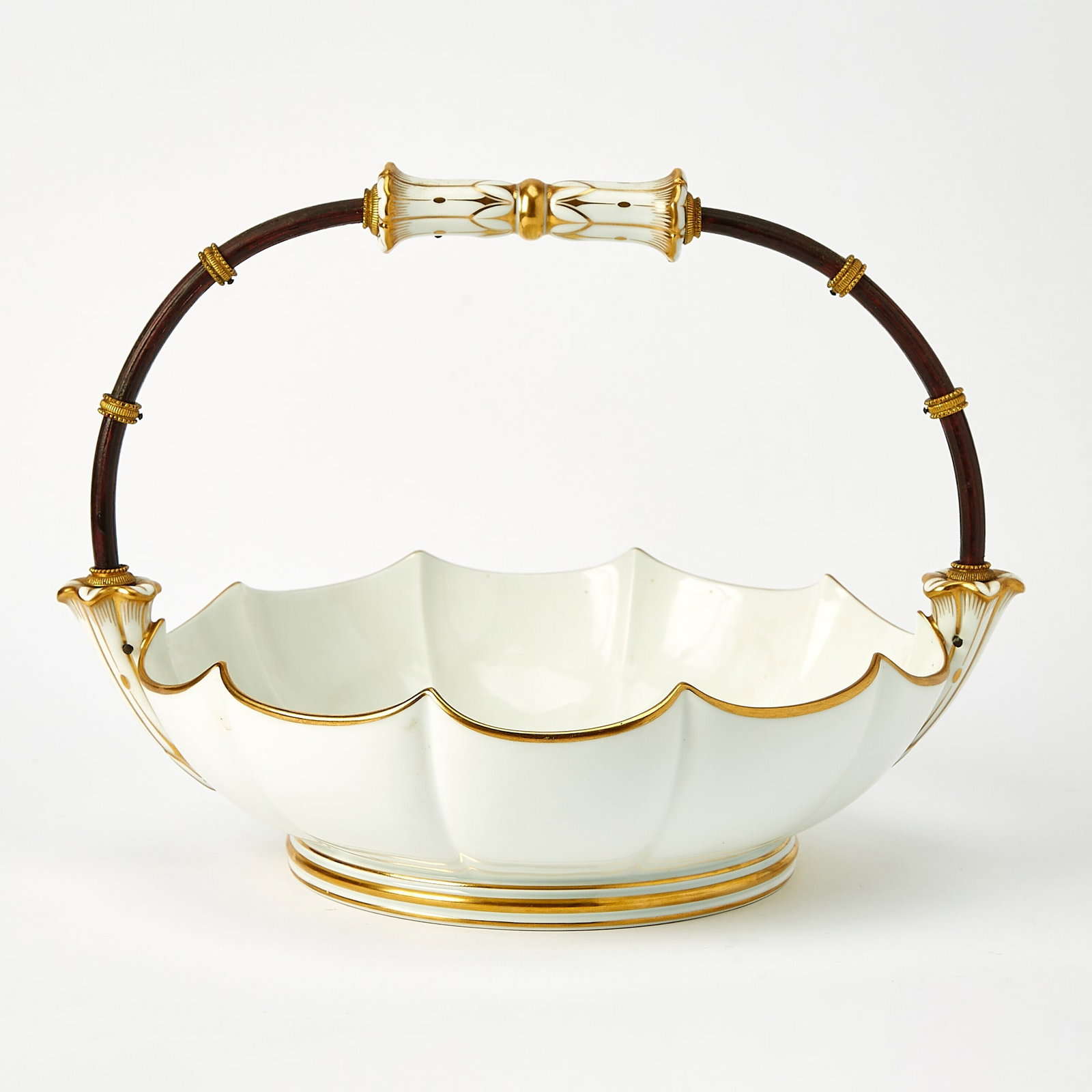 Sèvres Porcelain Rosewood Handled Centerpiece Basket: Dated 1883 Height 10 1/2 inches, width over handles 14 1/2 inches.
