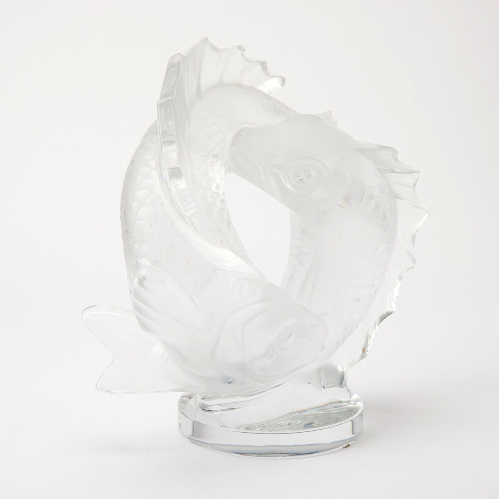 Lalique Crystal Double Fish Sculpture: Designed by Marc Lalique in 1953. Height 11 1/2 inches, width 10 1/2 inches, depth 5 1/4 inches.