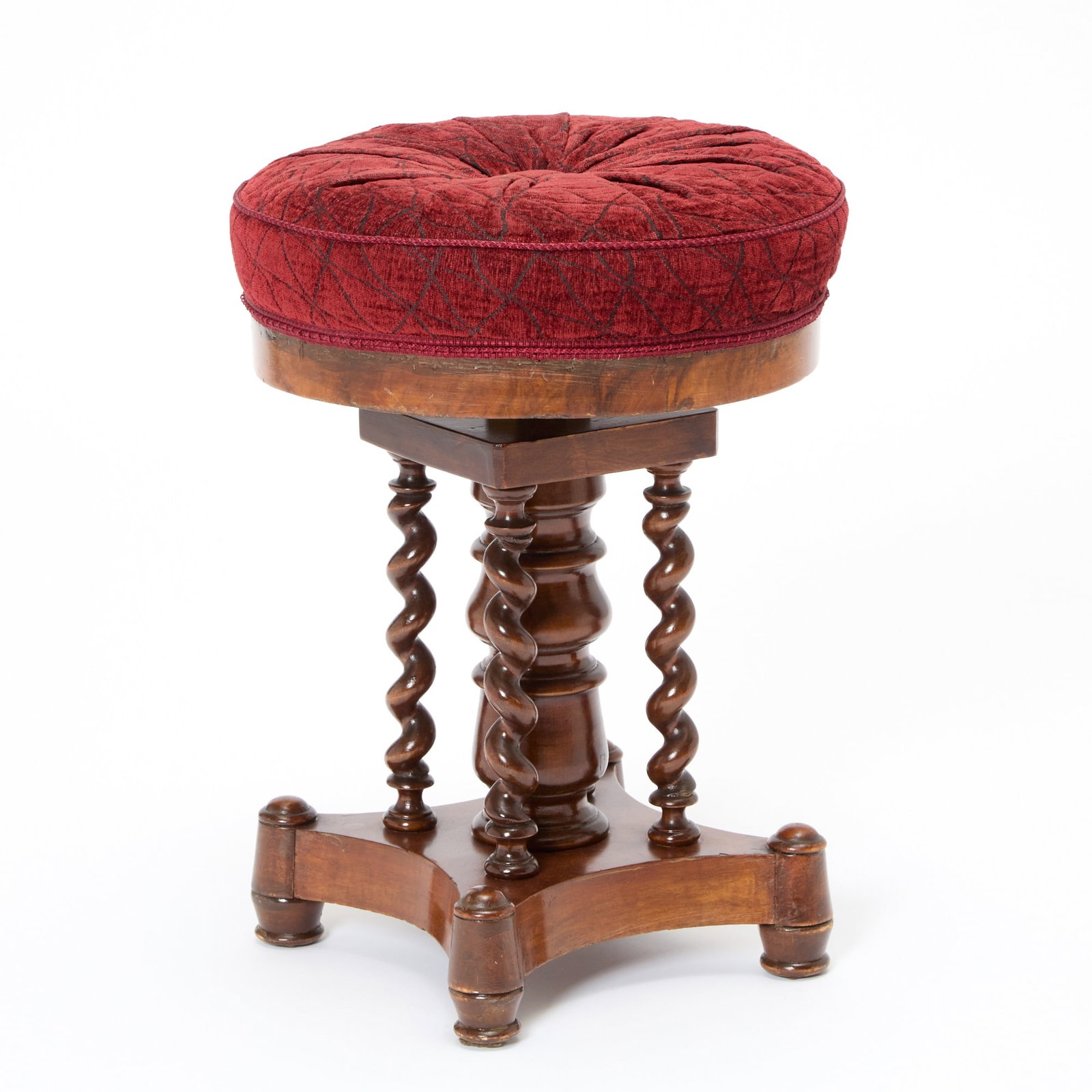 Victorian Upholstered Mahogany Piano Stool: Late 19th century With barley twist pedestal base and adjustable height burgundy upholstered seat. Height 19 inches, diameter 14 inches.