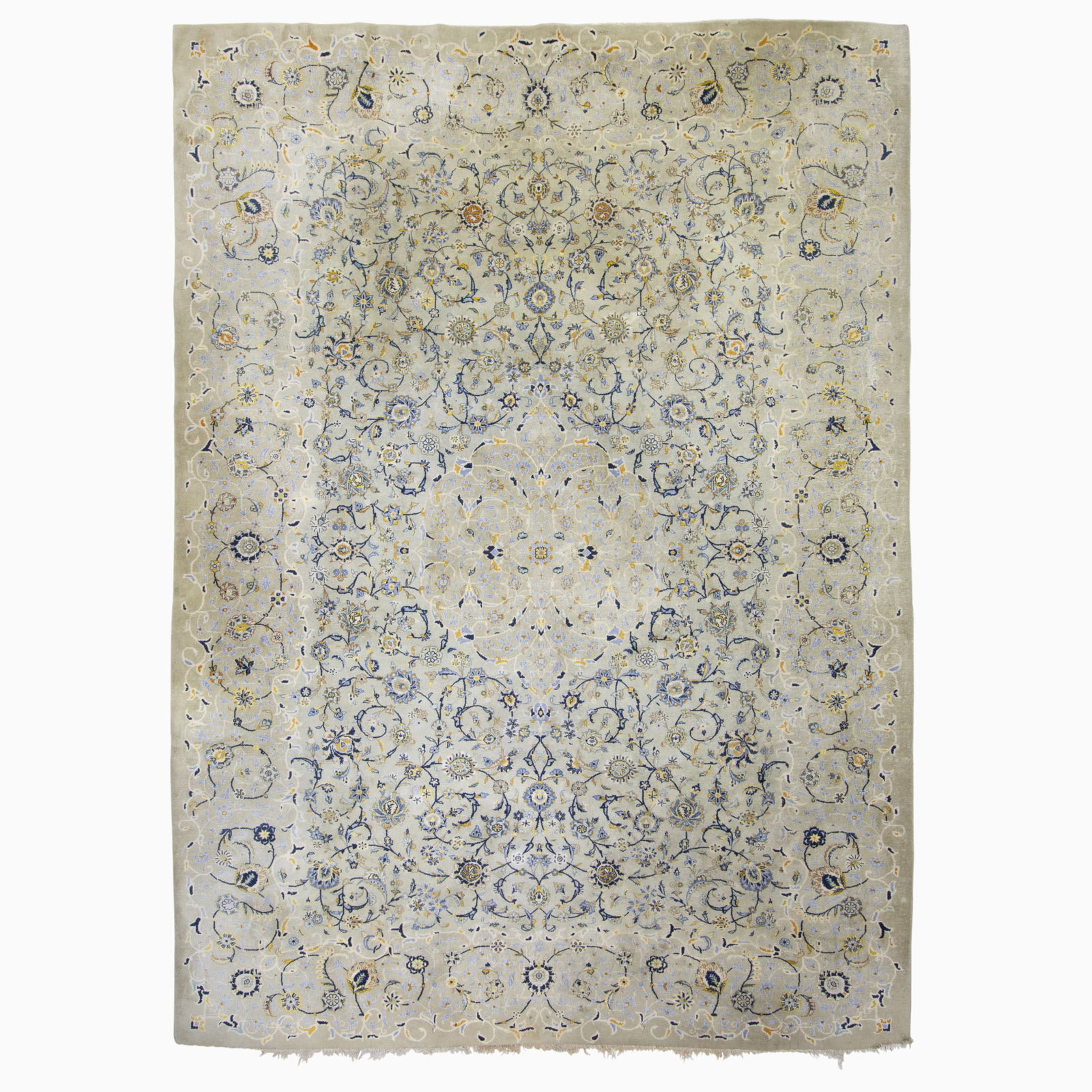 Kashan Carpet: Central Iran, third 1/4 20th Century The central medallion flanked by floral vinery on the celadon field is within a slate palmette and vine border. (13' 3" x 9' 4") Stains, soiled areas, minor