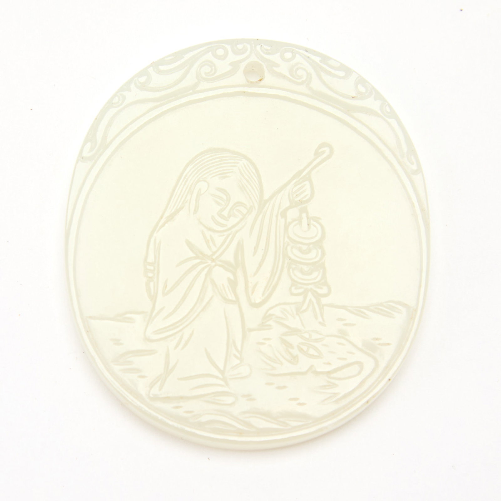 A Chinese Carved White Jade Pendant Qing Dynasty: Of oval form, decorated with Liu Hai and the toad, the reverse carved with the characters ji xiang ru yi within a square panel. (Length 2 inches)