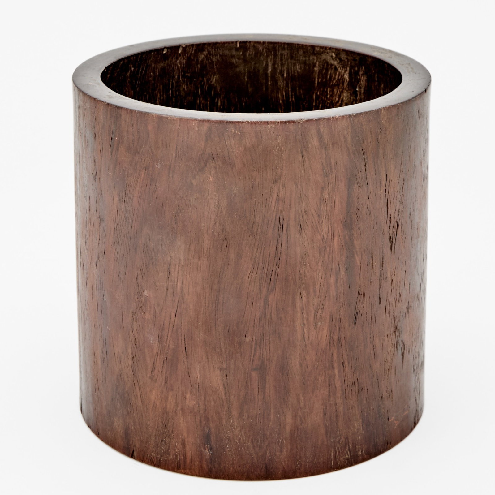 A Chinese Zitan Wood Brush Pot Late Qing-Republic Period: Of cylindrical form, unadorned. (Height 6 inches)