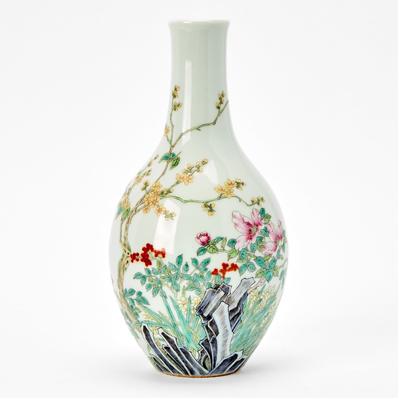 A Chinese Enameled Porcelain Bottle Vase Qianlong mark, Republic Period: Decorated with blossoming branches emerging from a rock. (Height 8 inches)