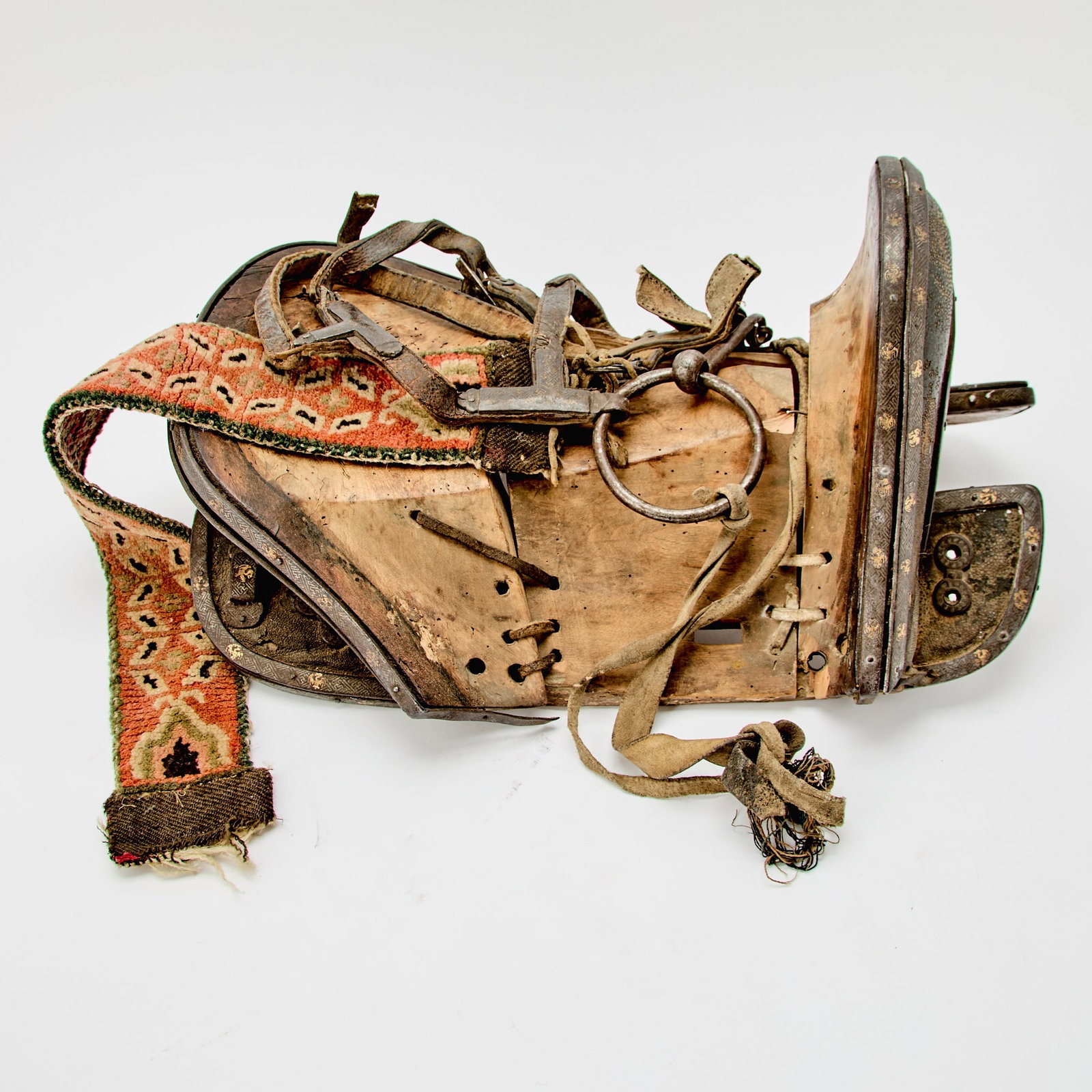 A Tibetan Wood, Inlaid Iron, and Shagreen Saddle Likely 19th Century (1 of 4)