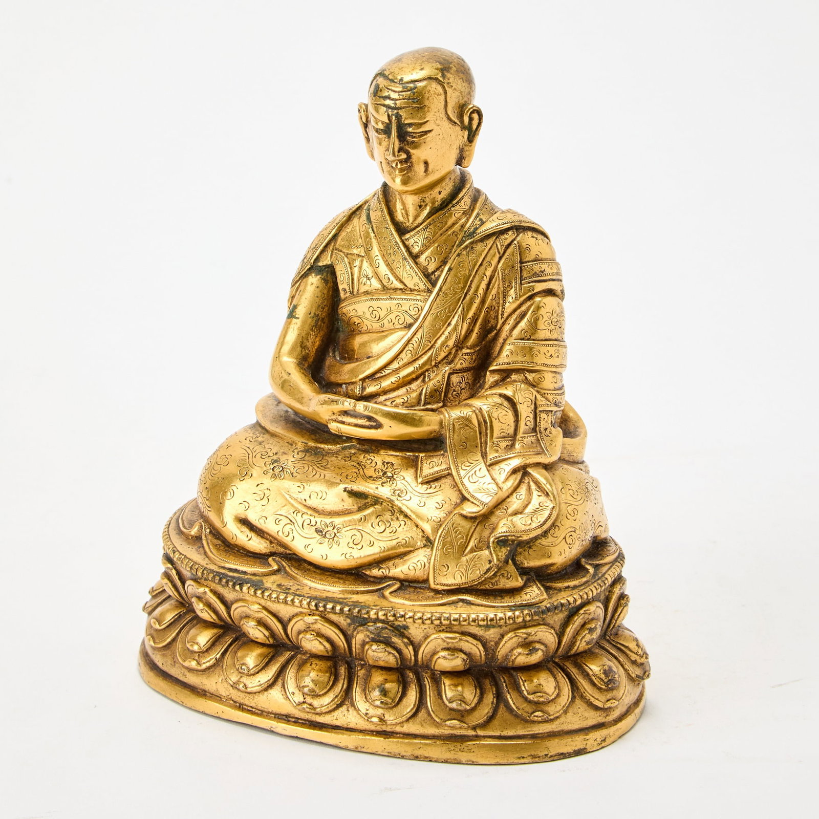 A Tibetan Gilt Bronze Figure of Lama 17th-18th Century (1 of 4)