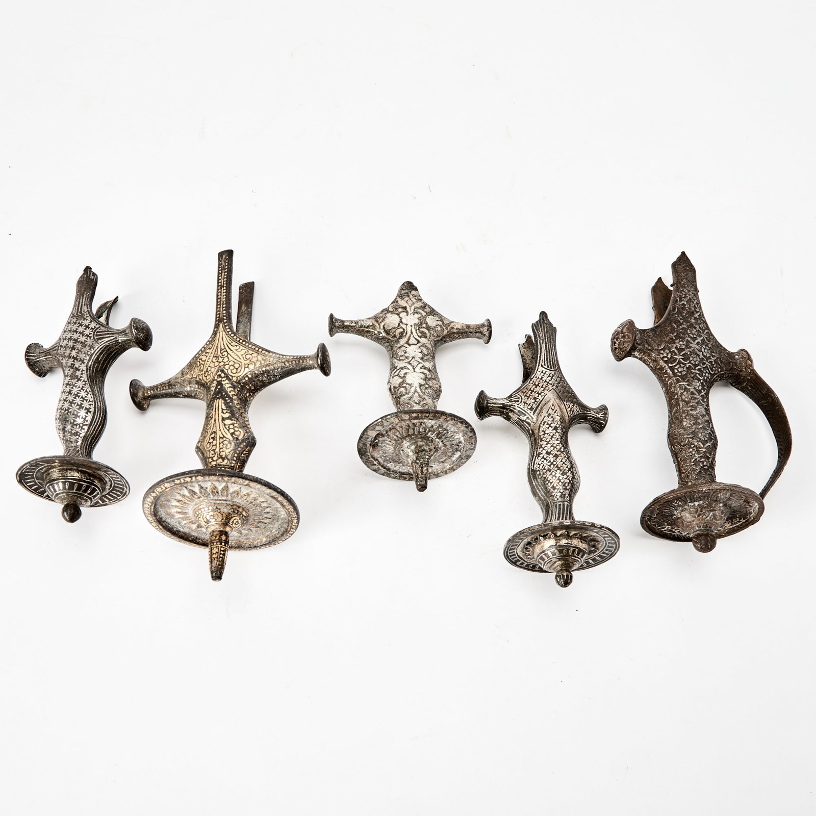 Five Indian Silver and Brass-Inlaid Alloy Bidri Ware Talwar Handles Deccan, 18th-19th century (1 of 7)