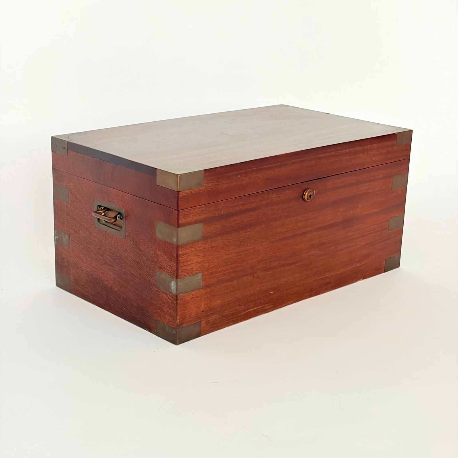 Brass Bound Benson & Hedges Mahogany Humidor: Early 20th century Height 10 inches, width 21 inches, depth 12 1/4 inches. chip to top.