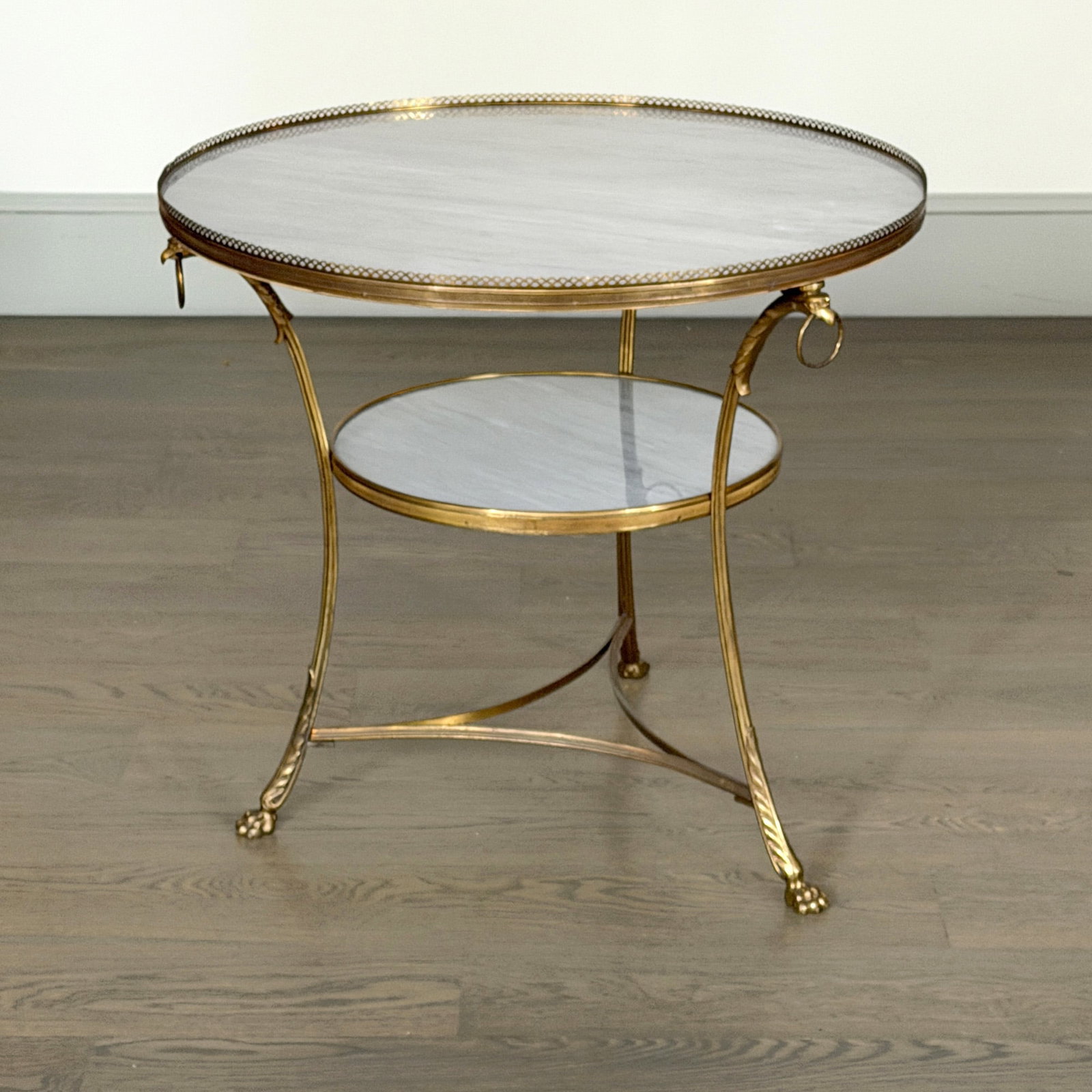 Louis XVI Style Gilt-Bronze Marble Top Gueridon: Height 29 inches, diameter 31 3/4 inches.