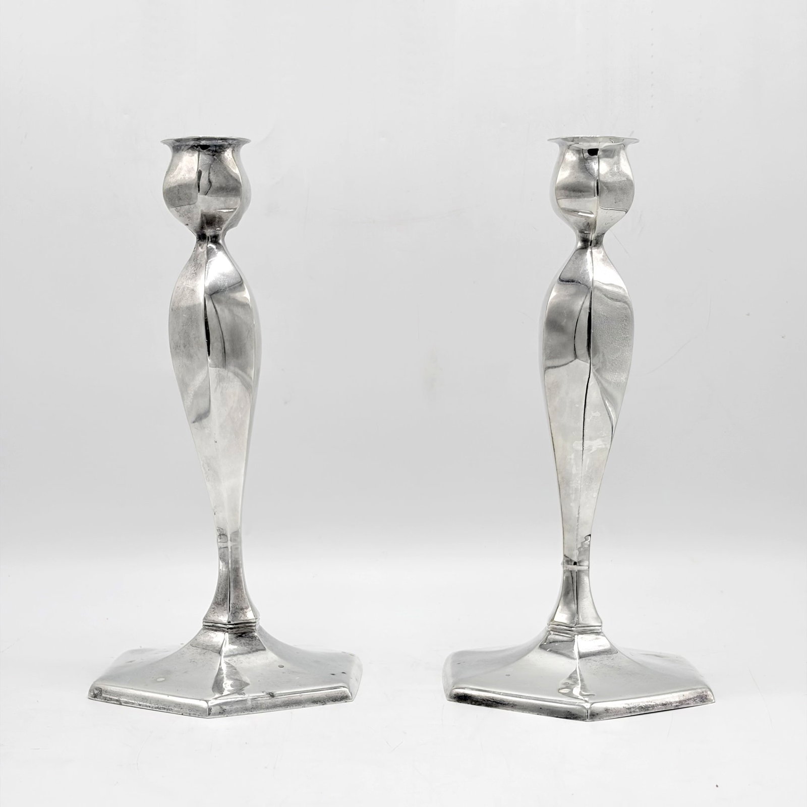 Pair of Black, Starr & Frost Sterling Silver Candlesticks: Second quarter 20th century Each faceted baluster-form stem on hexagonal base, with associated five-light branches. Height 9 1/2 inches, weighted.