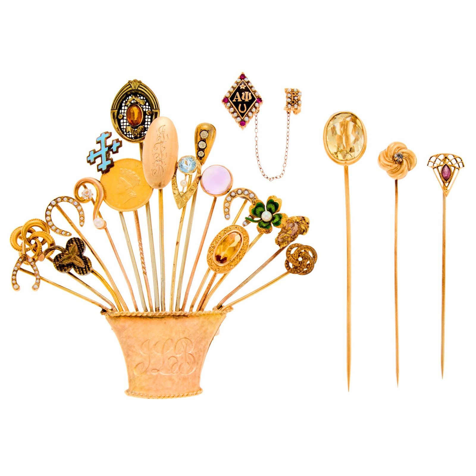 Gold, Low Karat Gold, Gilt-Metal, Gem-Set and Glass Stick Pin Brooch and Group of Stick Pins: 14 and 10 kt., vari-shaped orange, purple and colorless glass, amethyst, citrine, synthetic rubies and aquamarines, seed pearls, blue, black and green enamel, one coin, ap. 26.2 dwts. gross. Stamped o