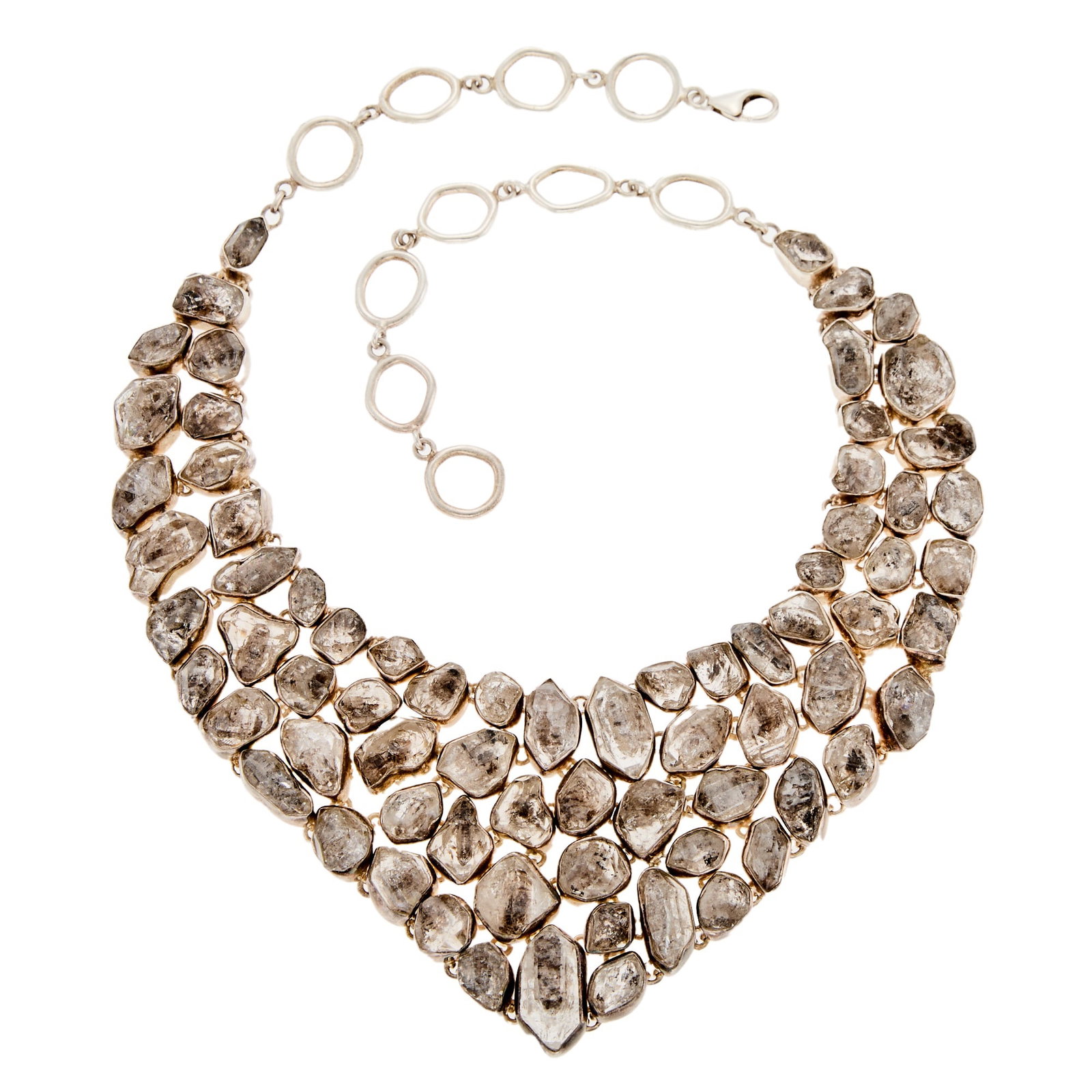 Silver and 'Herkimer Diamond' Quartz Crystal Bib Necklace: .925 silver, multi-rows of quartz crystals, signed SJ, ap. 160 dwts. gross. Length 20 inches, adjustable. Quartz: colorless, heavily included, semi-transparent. Bib width 2 3/4 to 3/8 inch.
