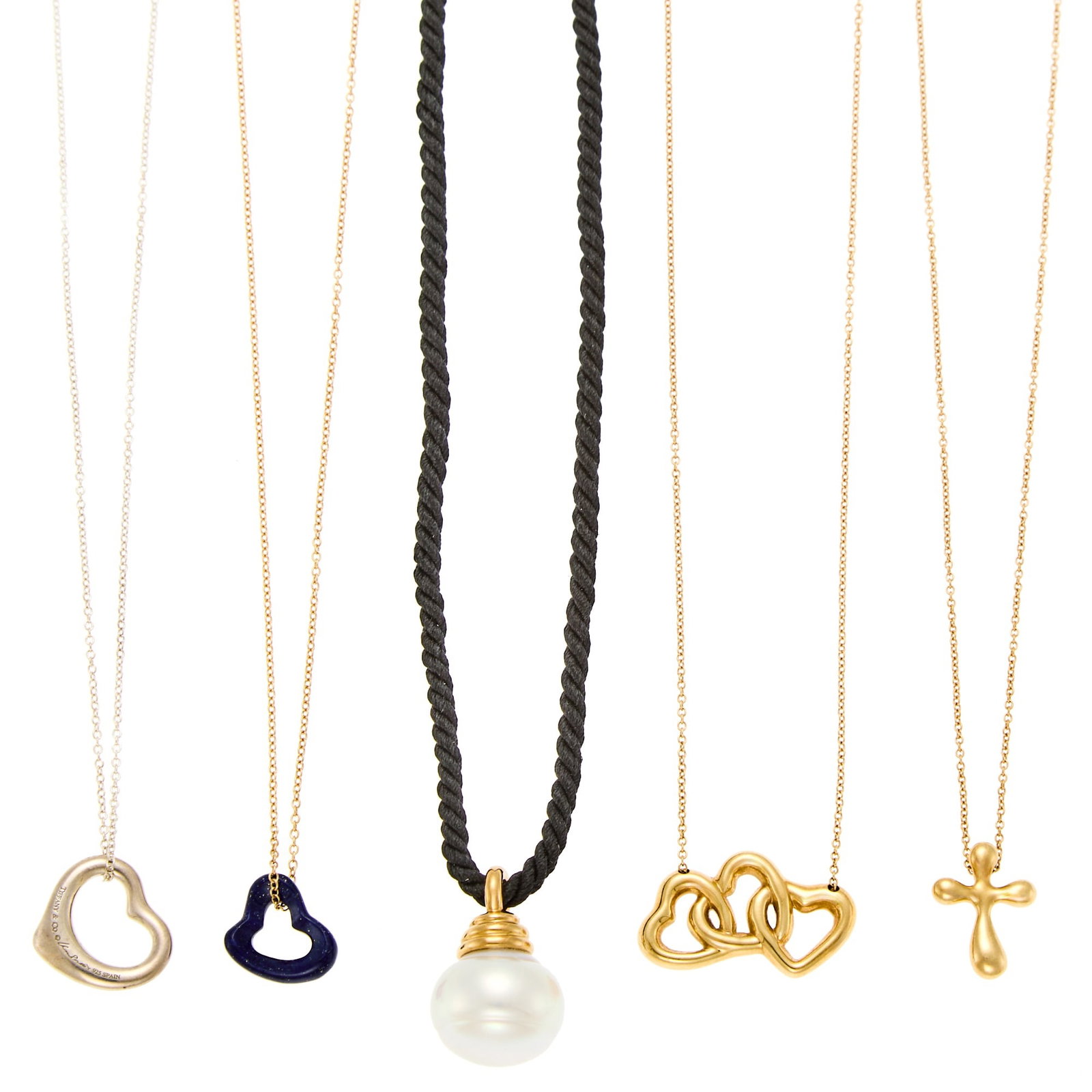 Tiffany & Co. Group of Gold, Silver, Silk Cord, Lapis and Semi-Baroque Cultured Pearl Necklaces: 18 kt., .925 silver, one carved lapis heart, one pearl ap. 15.0 x 12.0 mm., signed Tiffany & Co., open heart and cross necklaces signed Peretti, gold ap. 16.6 dwts. gross, silver ap. 2 dwts. Cord
