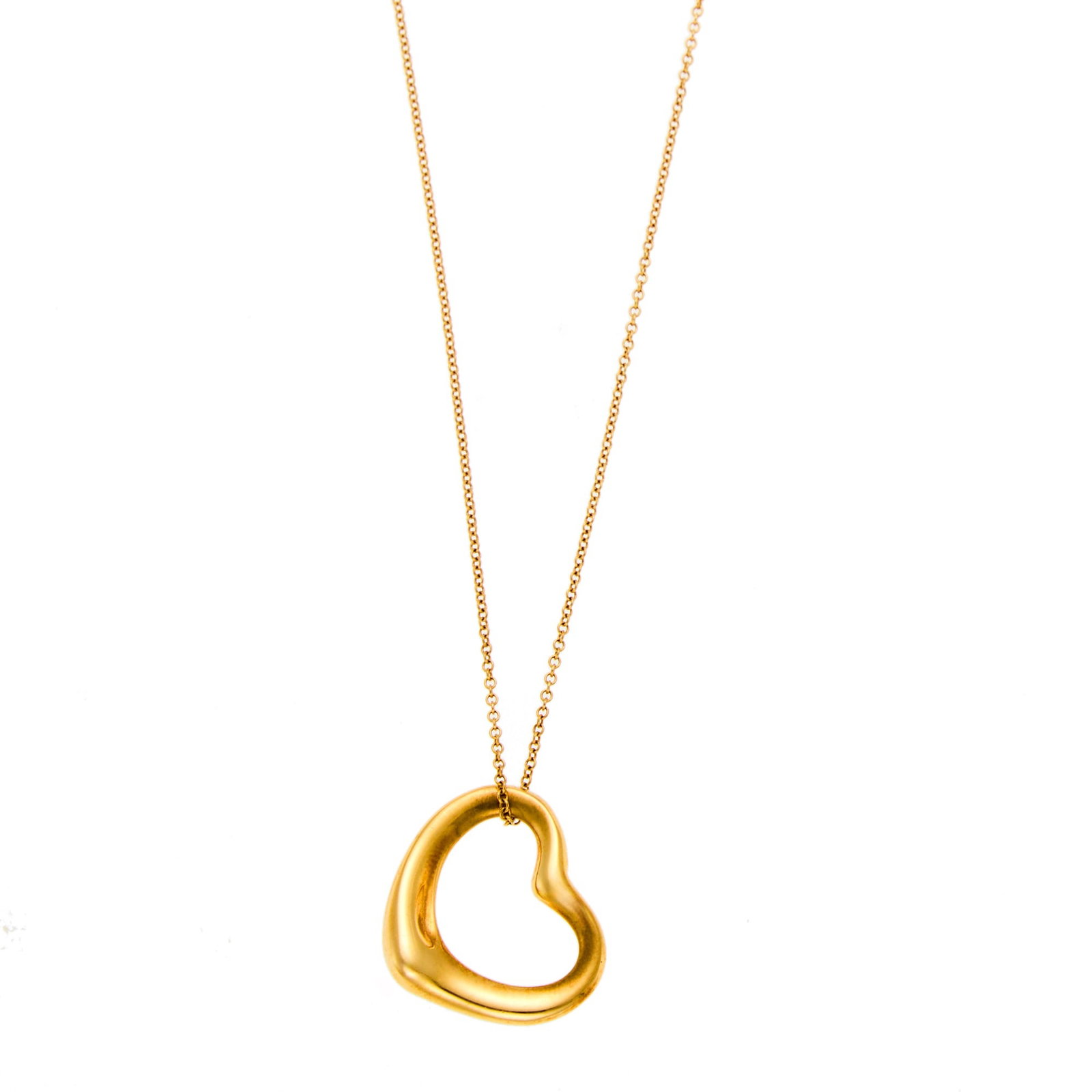 Tiffany & Co., Elsa Peretti Gold 'Open Heart' Pendant-Necklace: 18 kt., chain signed Tiffany & Co., Peretti, pendant signed Tiffany & Co., Elsa Peretti, ap. 4.5 dwts. Length 16 inches. Pendant 3/4 x 7/8 inch.