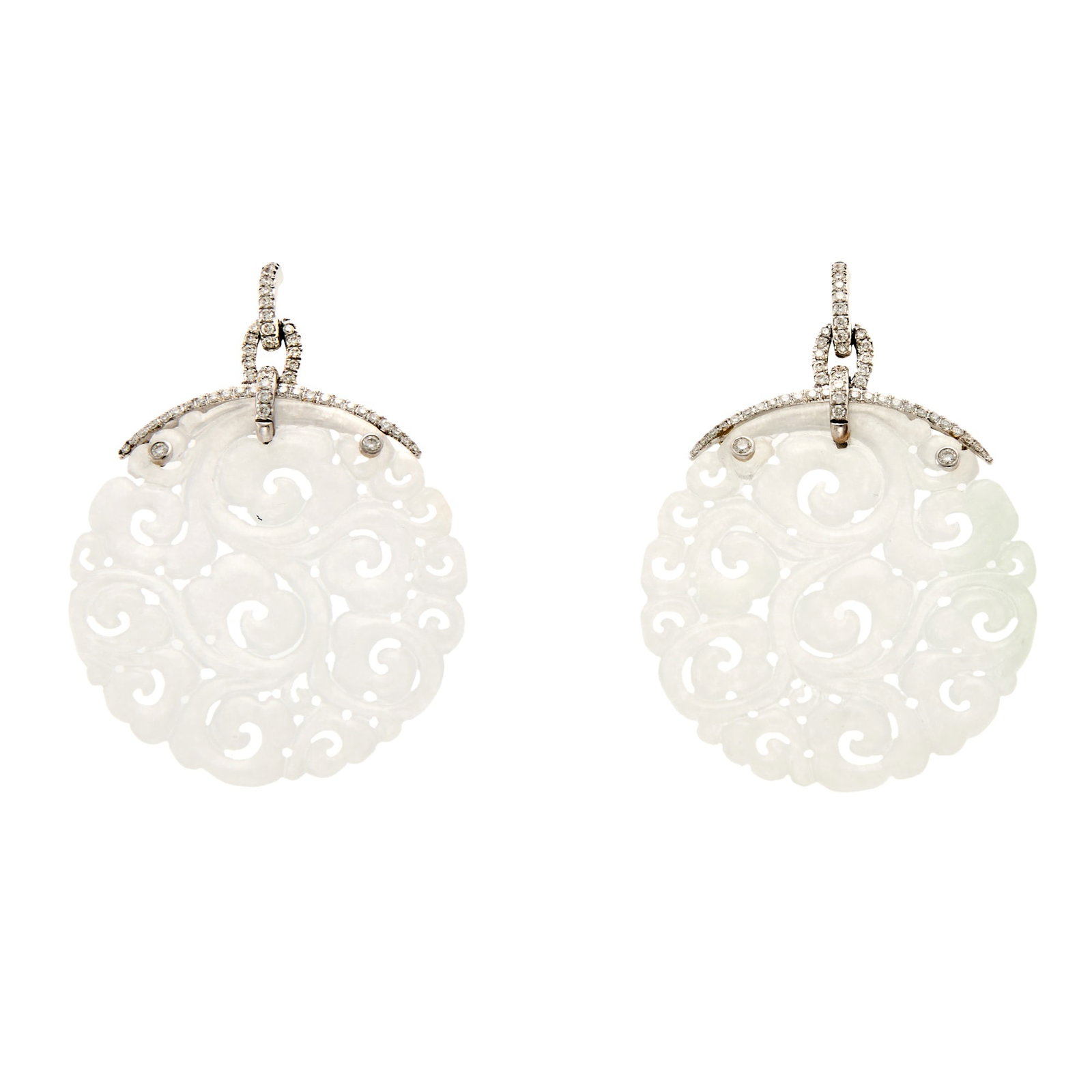 Pair of White Gold, Carved White Jade and Diamond Pendant-Earrings: 18 kt., 2 carved jade slices, 102 round diamonds ap. .55 ct., signed Jona, with Italian mark, ap. 8.9 dwts. gross. The jade has not been tested for treatment. Jade: white, one with greenish area at on