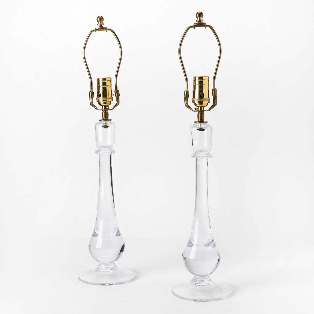 Pair of Simon PIerce Glass "Shelburne" Pattern Table Lamps: Each in colorless glass, signed. Height overall 22 3/4 inches; height of body 14 inches.