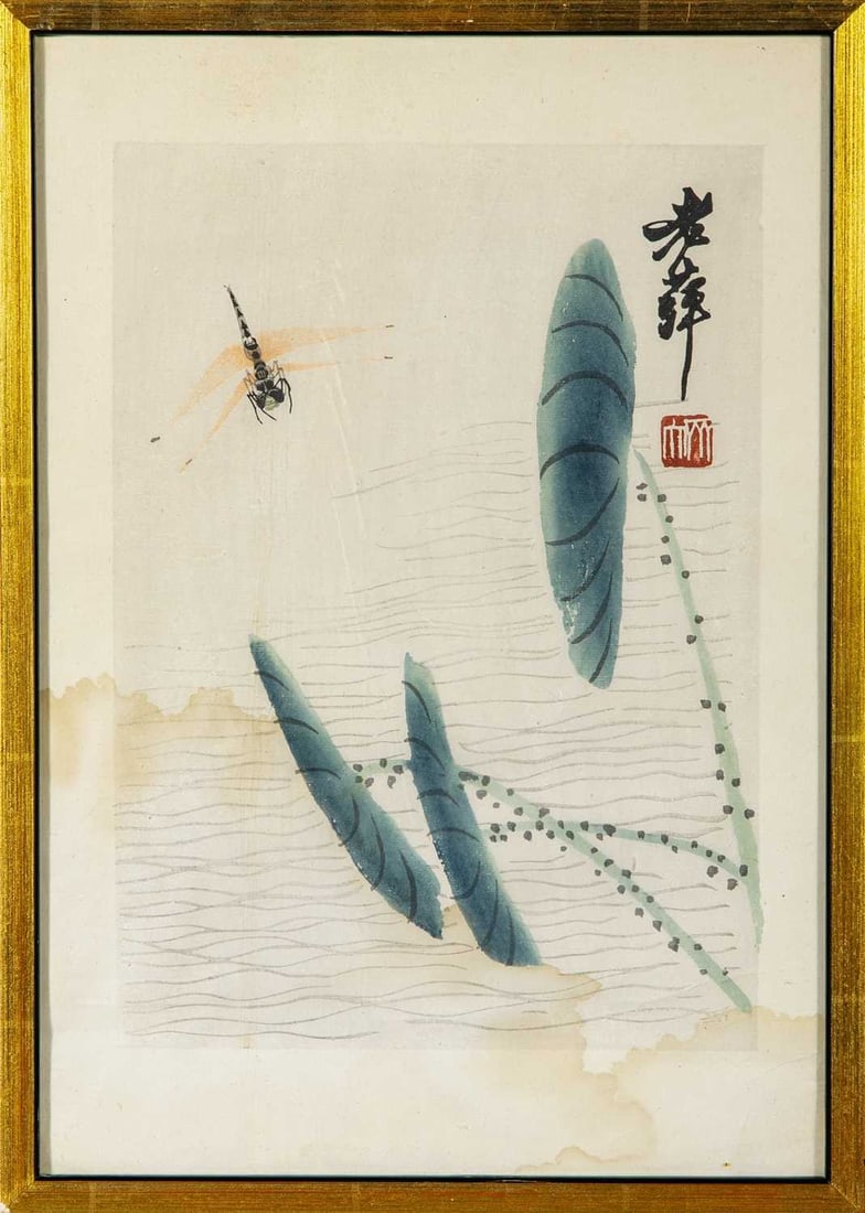A Chinese Album Leaf Print After Qi Baishi 20th Century: Depicting a dragonfly over lotus leaves; framed. (Sight 7 1/2 x 10 3/4 inches)