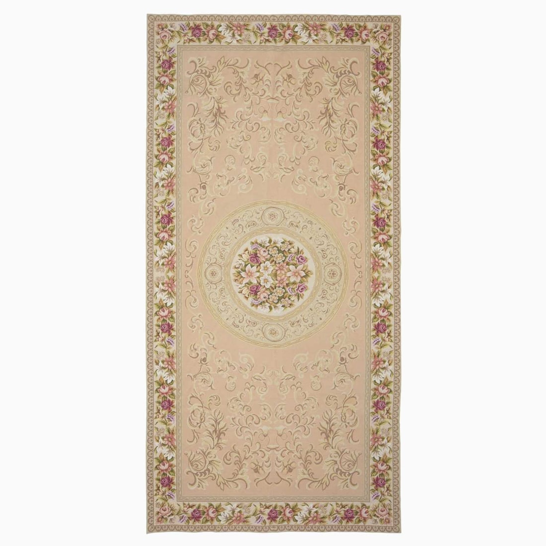 Aubusson-Style Needlepoint Rug: China, Contemporary The central circular medallion on the terracotta field is within an ivory floral garland border. (9' 11" x 4' 11") Small spot stains