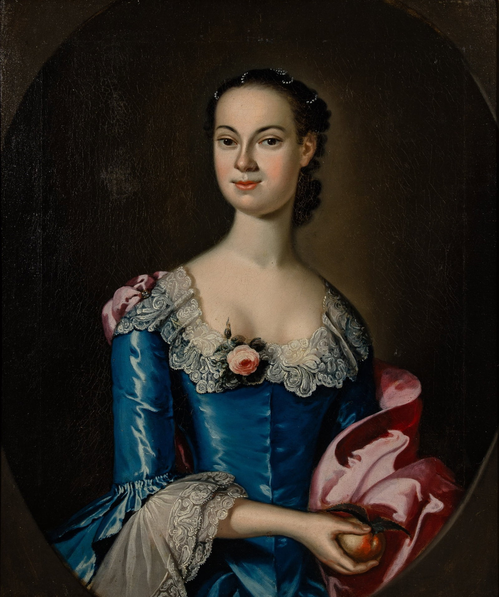 Attributed to Joseph (Jonathan) Blackburn: Portrait of a Lady Holding an Apple Oil on canvas 30 1/4 x 25 1/4 inches (76.8 x 64.1 cm) Frame 36 3/4 x 31 5/8 inches (93.5 x 80.5 cm)