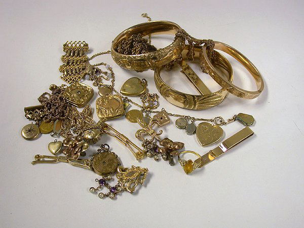 Group of Assorted Gold-Filled and Metal Jewelry Ite: Group of Assorted Gold-Filled and Metal Jewelry Items Comprisng assorted chains, bracelets, pendants, earrings, pins, etc.