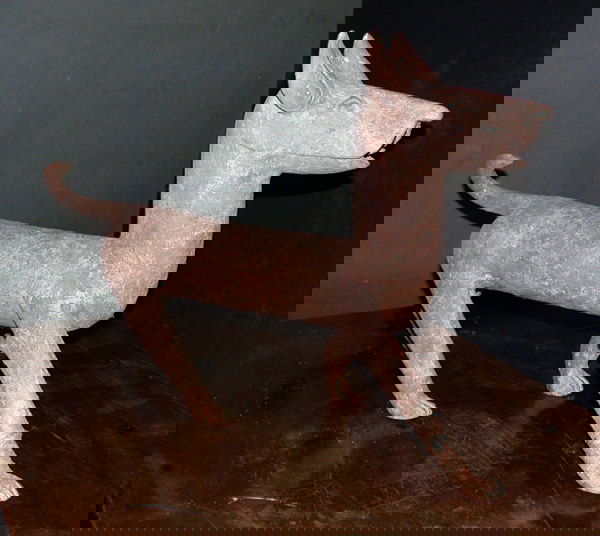 Chinese Red Pottery Model of Walking Dog: Chinese Red Pottery Model of Walking Dog Han Dynasty Modeled pacing with the head and tail raised. Height 13 1/4 inches (33.6 cm), width 18 inches (45.7 cm). Oxford thermoluminescence sample number c