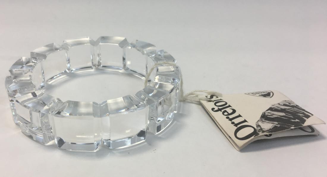 Kenneth Jay Lane for Orrefors Modernist Crystal Bangle: Circa 1970's. Signed Orrefors Crystal Bangle. Comes with original hang tag. Measures .75" wide. Fits 7.5" wrist.