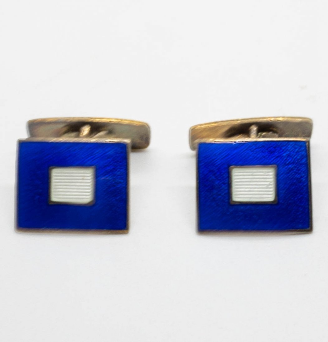 Mid Century Scandinavian Blue Enamel Cufflinks Sterling: Mid Century modern cufflinks featuring bright blue and white enamel on sterling silver with a gold wash. .75" long x .5" wide. Marked Sterling, 925, OPRO.