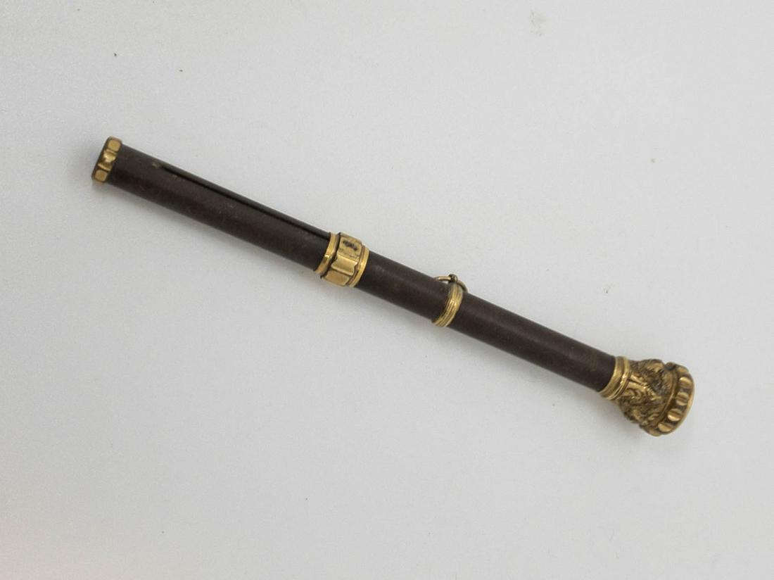 Antique Mechanical Pencil Gold Filled Red Stone: An antique mechanical pencil featuring ornate gold filled accents and a red stone with a monogrammed intaglio. 4.75" long