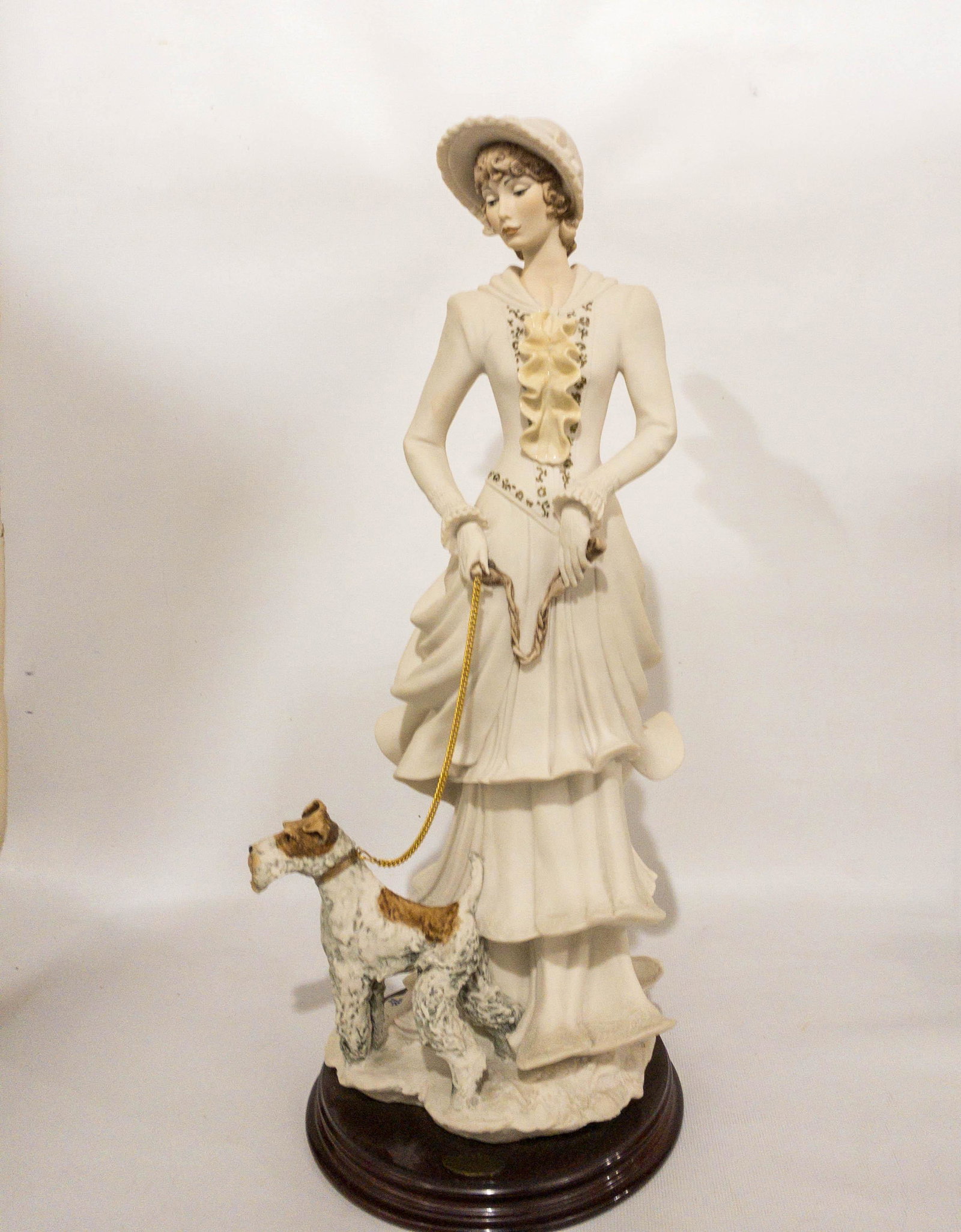 Florence Giuseppe Armani Figurine Victorian Woman: Large Florence Giuseppe Armani Figurine of a Victorian woman walking a dog. Signed Giuseppe Armani. 19" high, 6.5" diameter base.