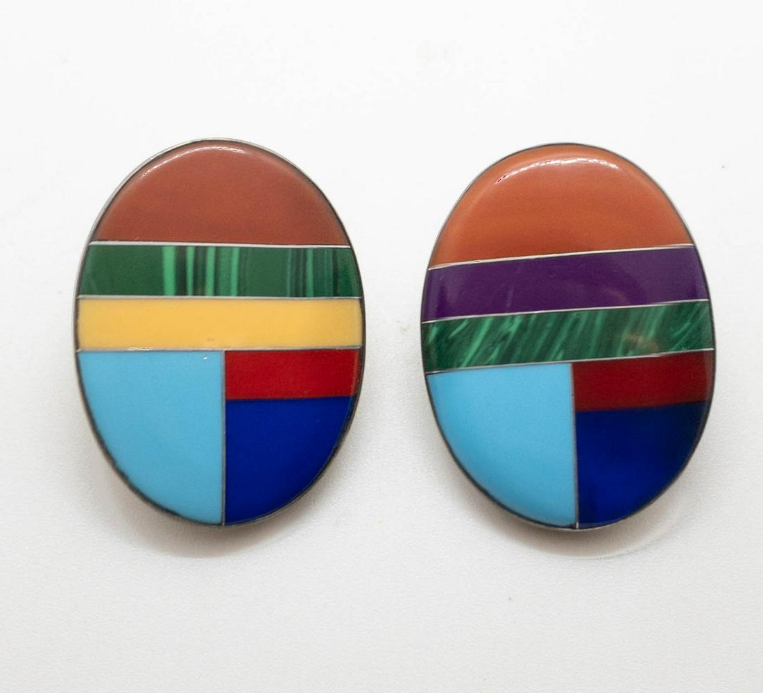 Signed Native American Inlay Earrings Turquoise Coral &: Native American oval earrings in sterling silver featuring multi-stone inlay. Posts with butterfly backs. 1.5" long x 1.25" wide. Signed: WS.