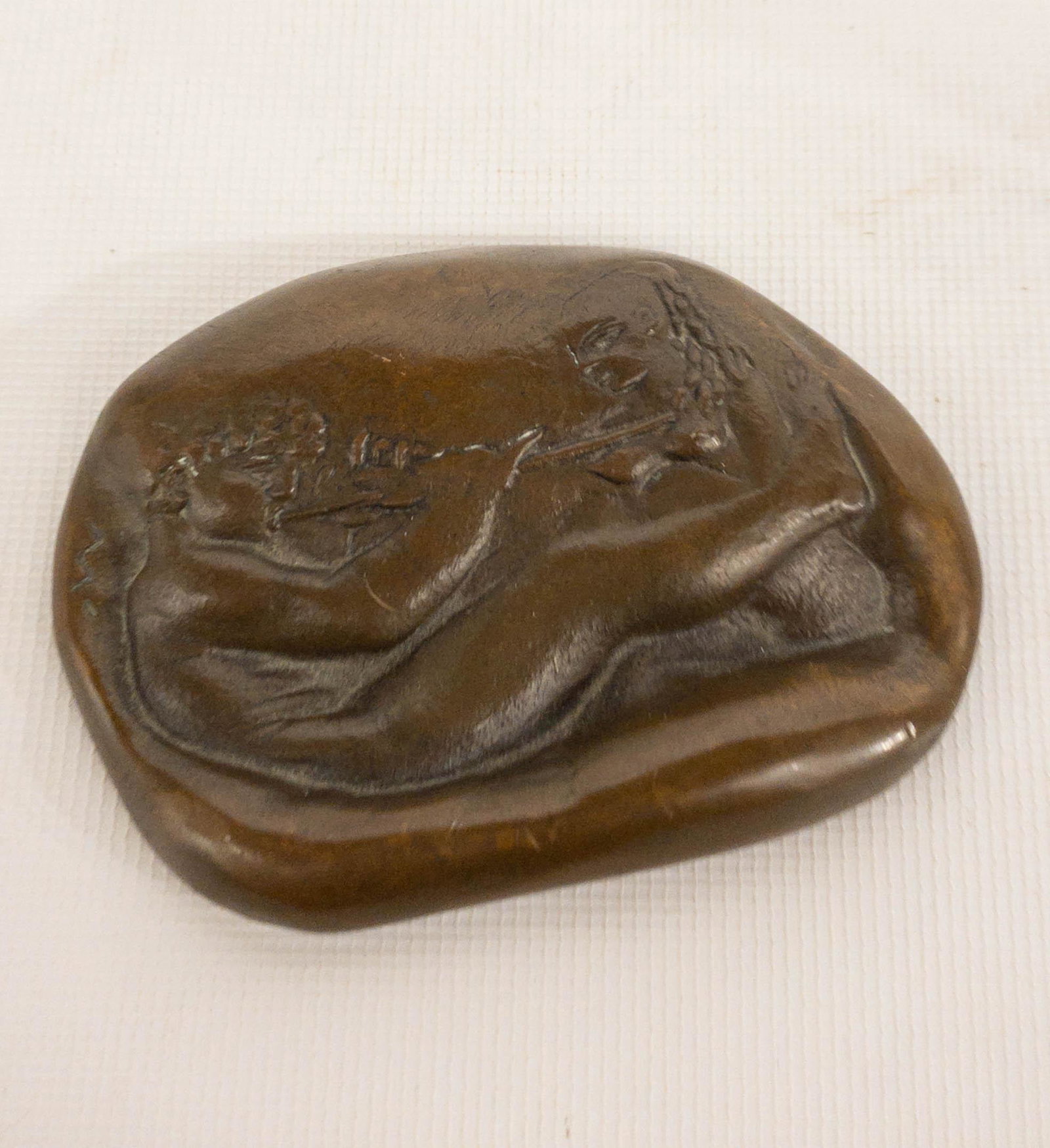 Antique Bronze Paperweight Nudes: Antique bronze paperweight featuring a nude man and woman. Singed with a W or possibly an M. Numbered 1/10. 3.5" long x 2.5" wide/