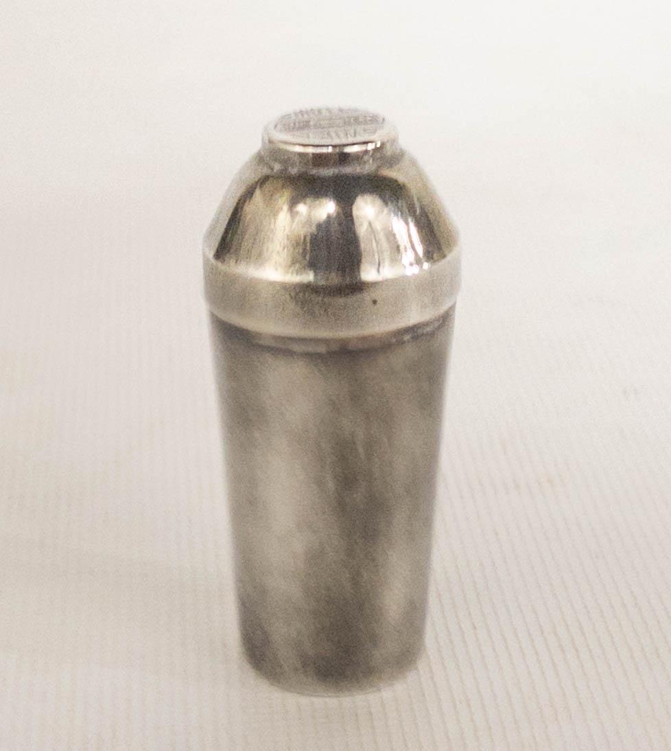 Antique Swift St Louis Sterling Silver Dice Shaker: Small sterling silver dice shaker with 6 tiny dice inside. Marked on lid: Swift, St Louis. Weight: 16.9 grams.