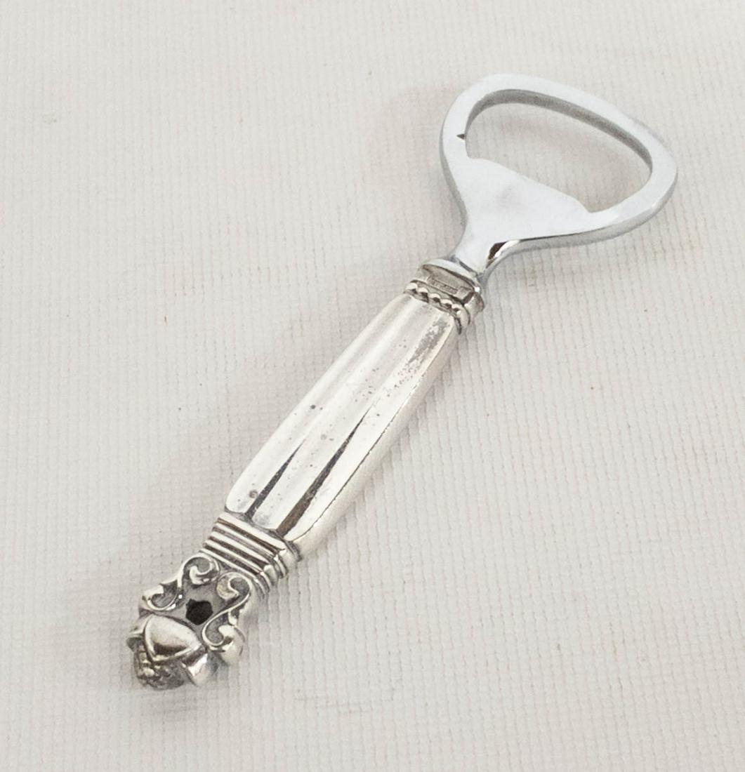 Georg Jensen Sterling Silver Acorn Bottle Opener: Sterling silver bottle opener by Georg Jensen. Acorn pattern. Marked with GJ maker's mark and sterling. 4.5" long. 42.5 grams.