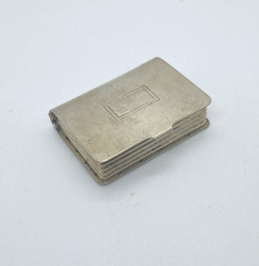 Antique Sterling Silver Pill Box: Antique sterling silver rectangular pill box with hinged lid. 1.5" long x 1" wide. Unmarked. Tested sterling.
