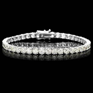 18k White Gold 12.00ct Diamond Tennis Bracelet: Retail: $49,600.00 ****** 18k White Gold 12.00ct Diamond Tennis Bracelet ****** Metal: 18k Solid White Gold / Size: 7.5 / Total Item Weight: 14.0 grams / Country Made: United States / / Main Stone: Di