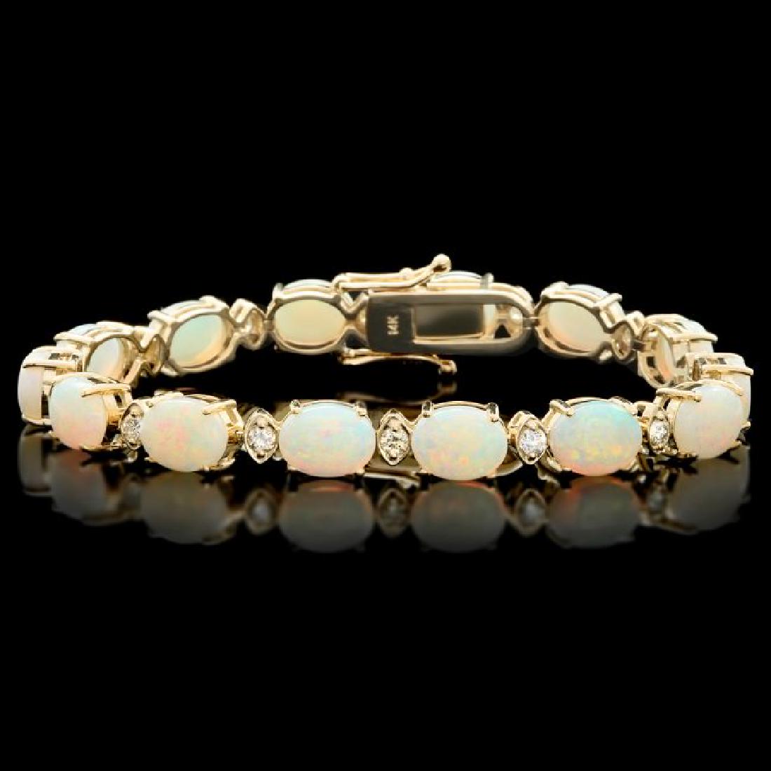 14k Gold 15.00ct Opal 1.10ct Diamond Bracelet: Retail: $12,300.00 ****** 14k Gold 15.00ct Opal 1.10ct Diamond Bracelet ****** Metal: 14k Solid Yellow Gold / Size: 7.5 / Total Item Weight: 18.0 grams / Country Made: United States / / Main Stone: Op